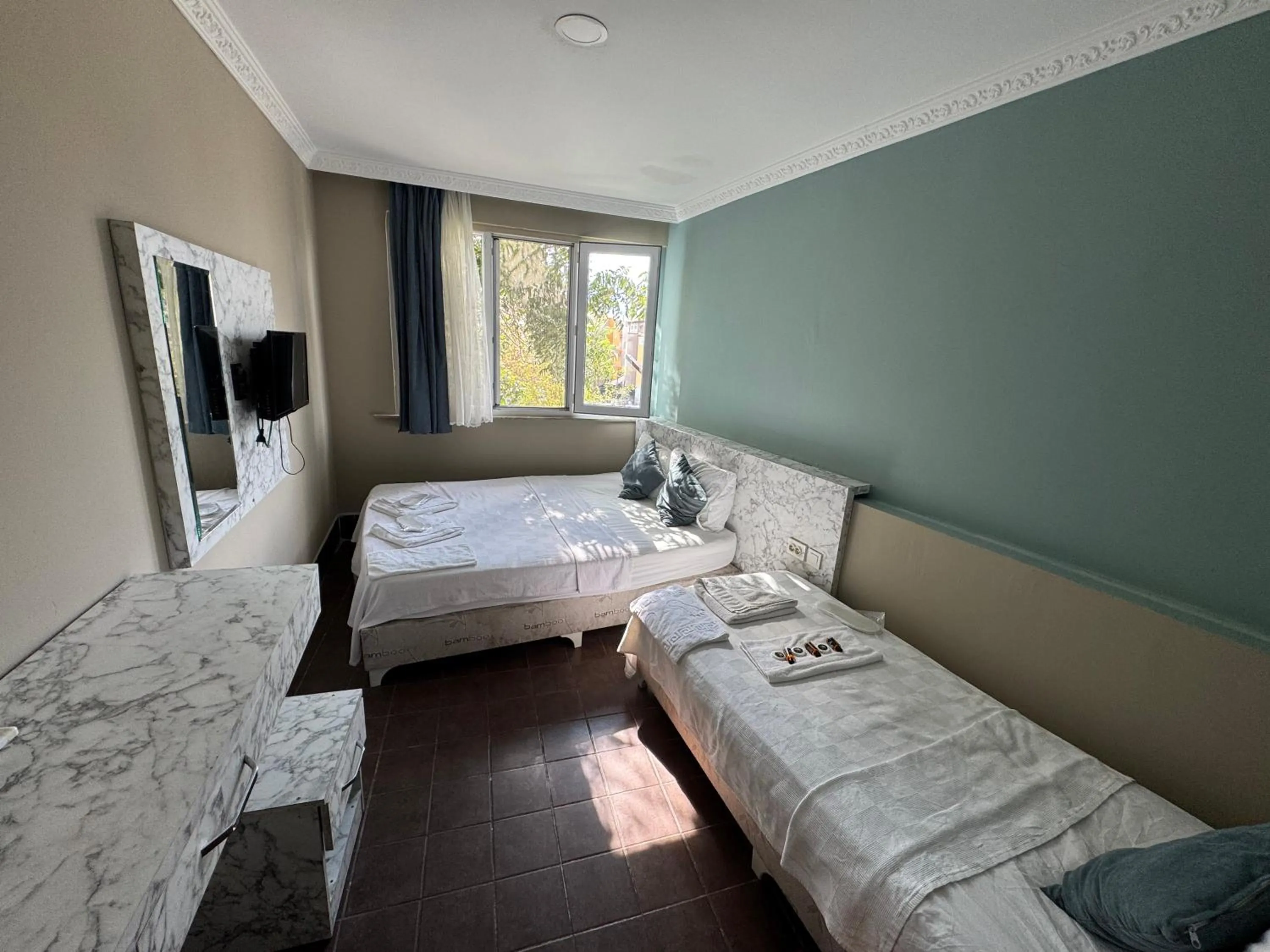 Bed in ERSOY EGE APART OTEL