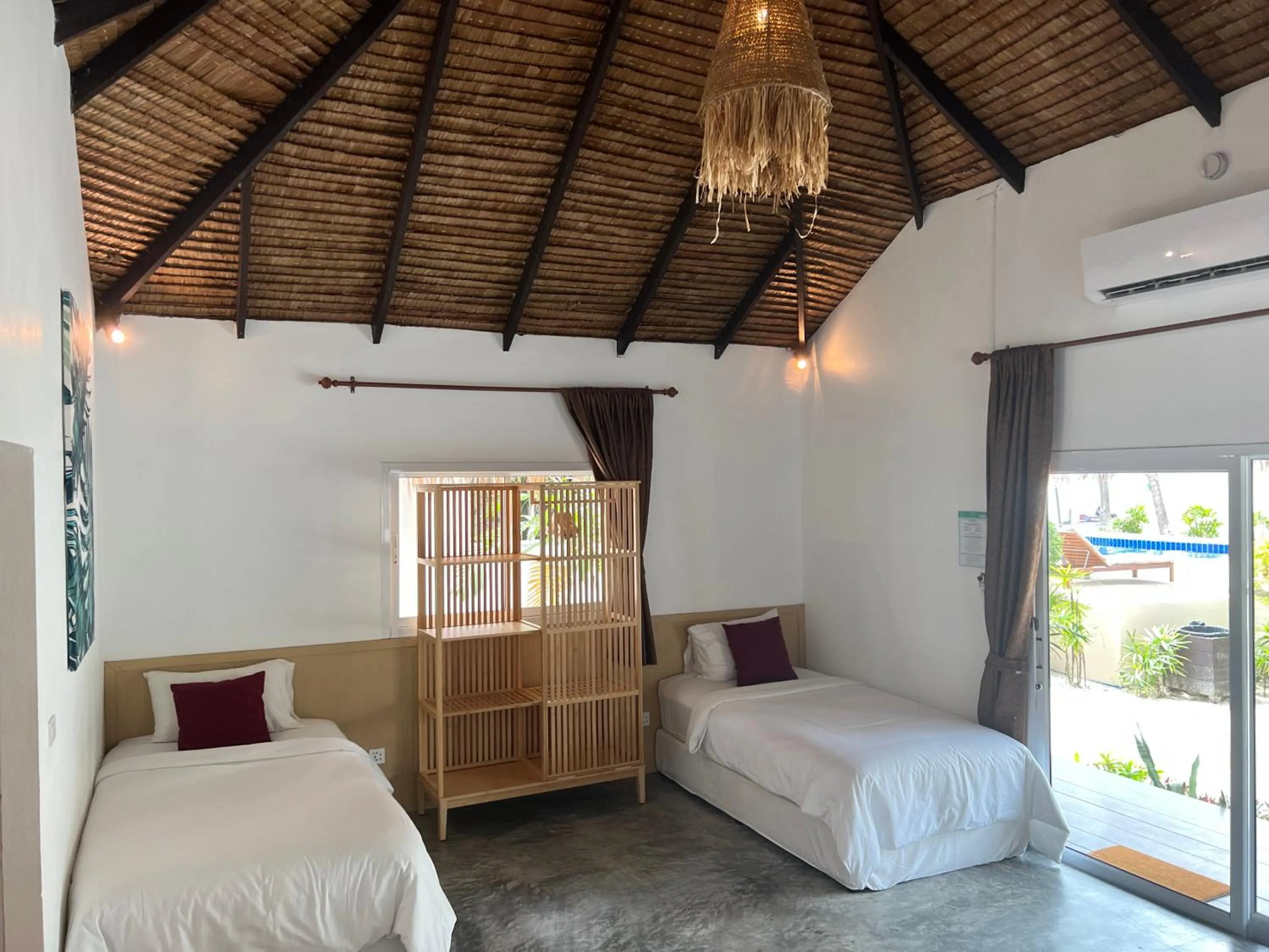 Bed in Sarana Bungalows