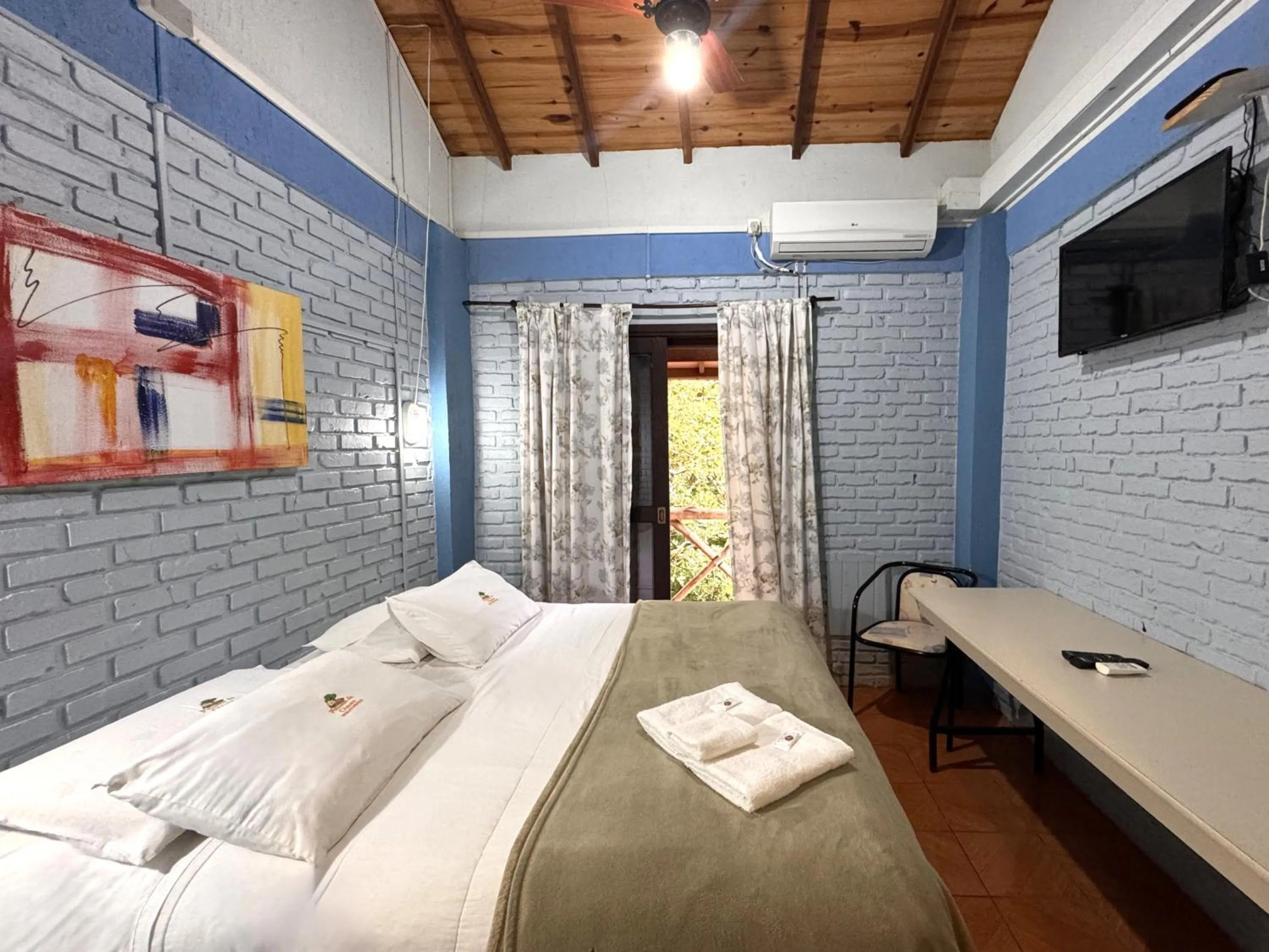 Bed in Pousada da Chacara