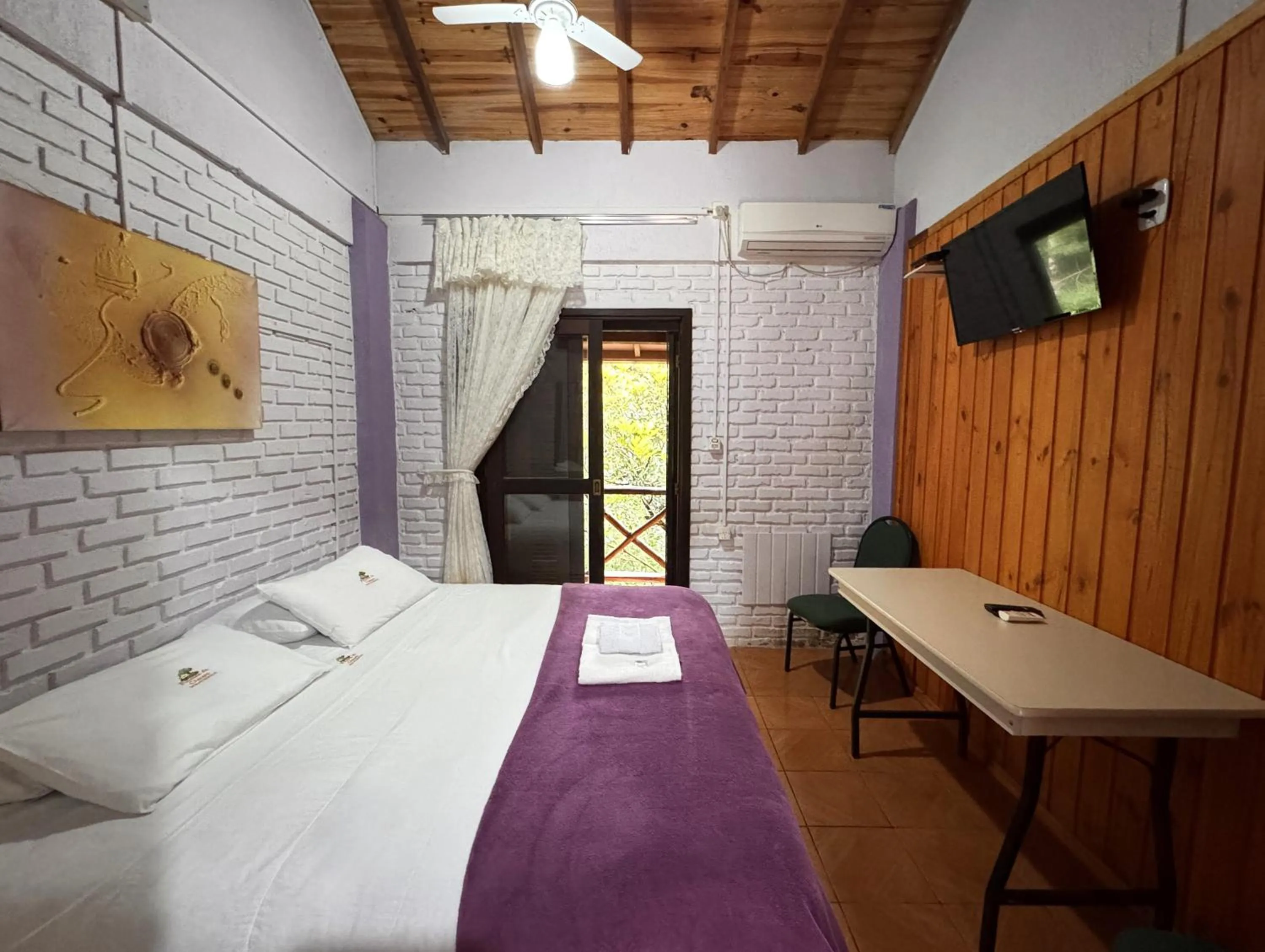 Bed in Pousada da Chacara