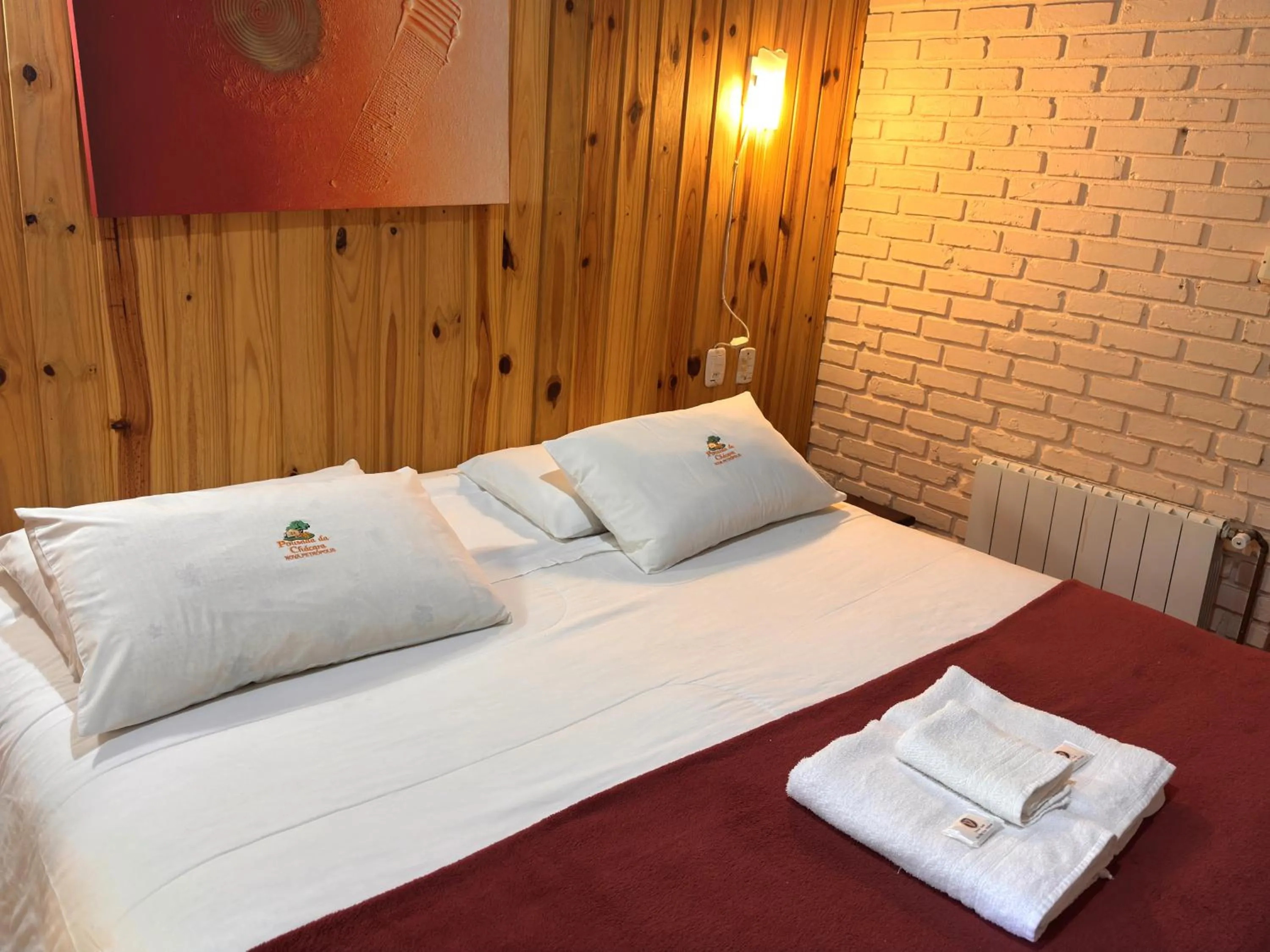 Bed in Pousada da Chacara