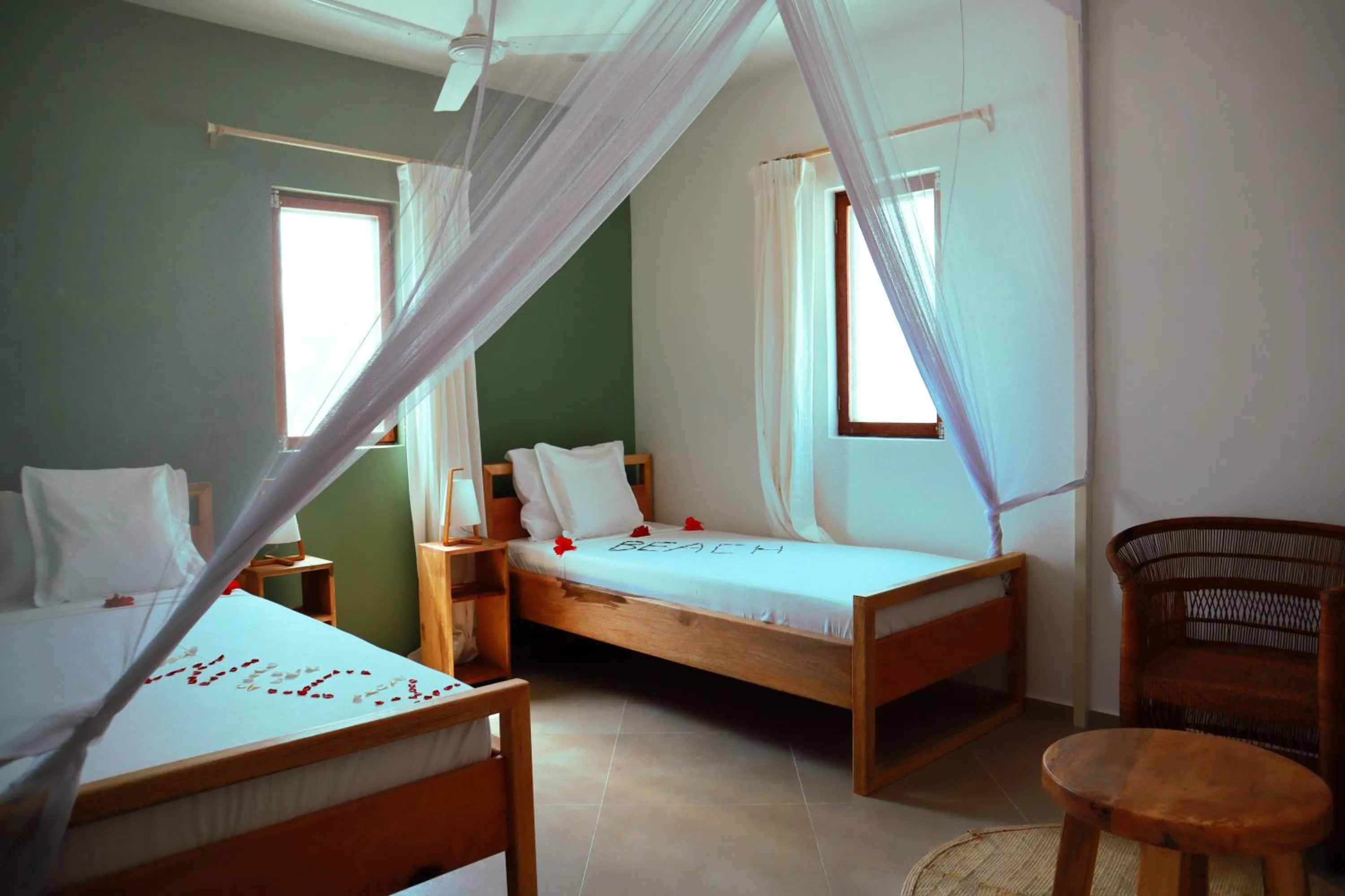 Bed in Kijani Beach Villas