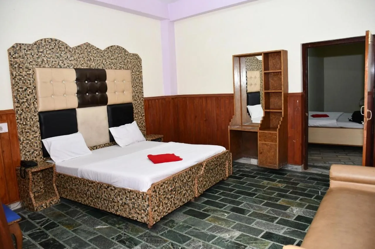 Bed in HOTEL HIMALYAN PARADISE