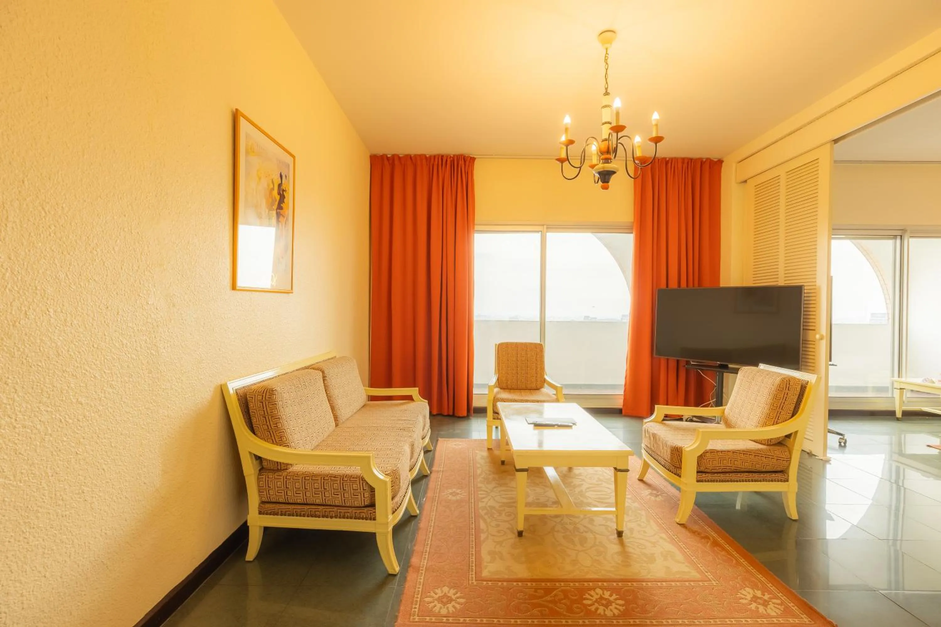 Communal lounge/ TV room in AKWA PALACE Douala