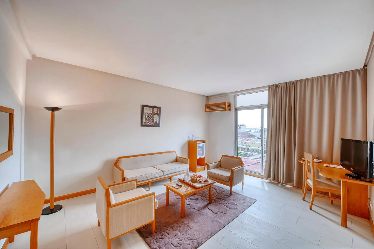 Communal lounge/ TV room in AKWA PALACE Douala