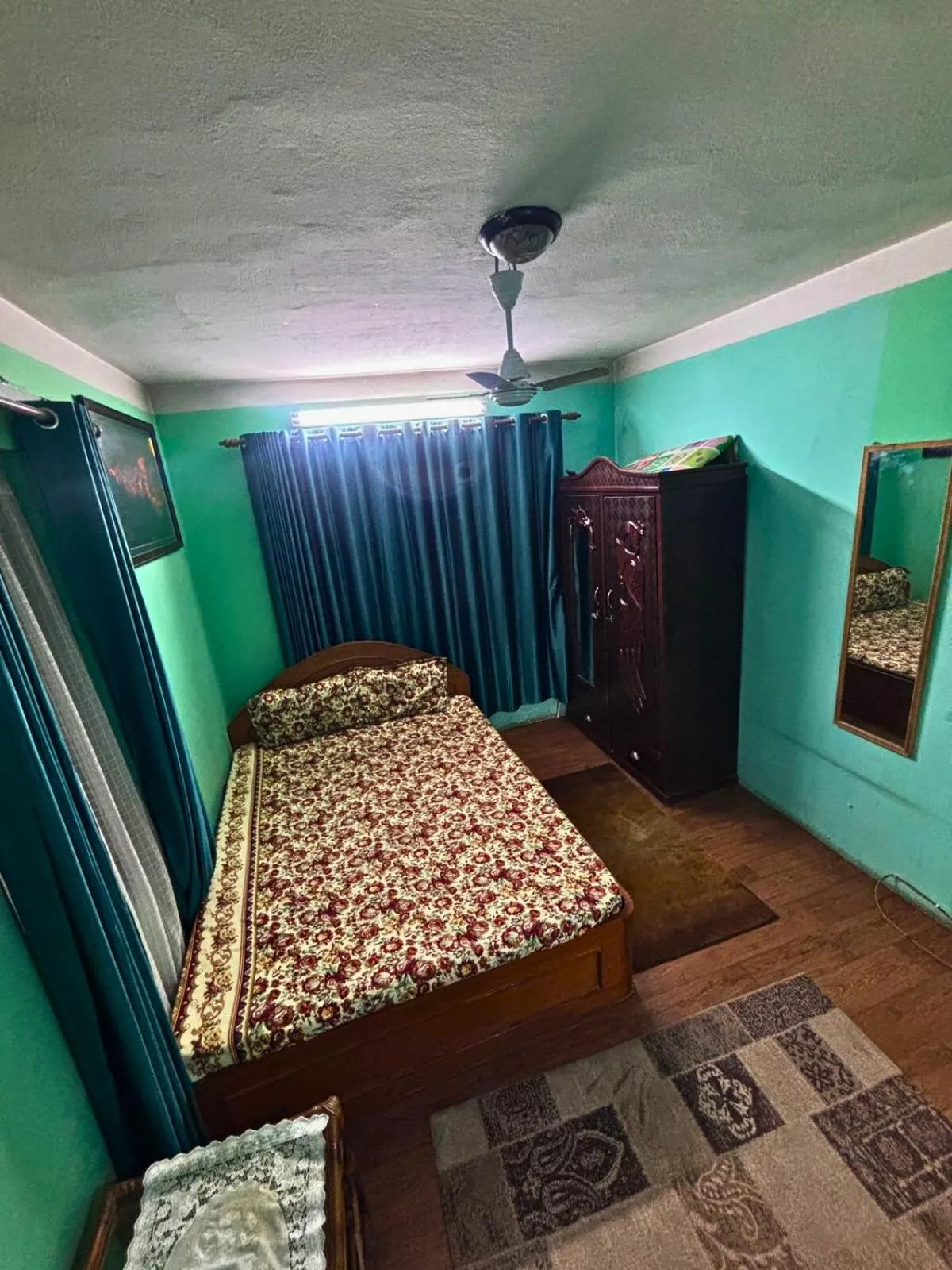 Bed in Deepjyoti Inn