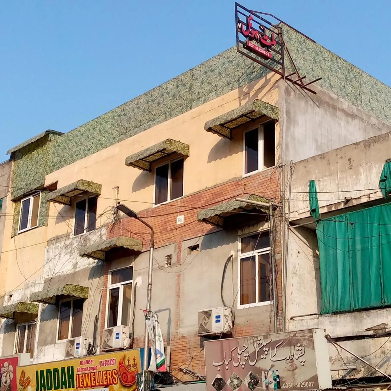 Property building in Millat Hotel G9-4