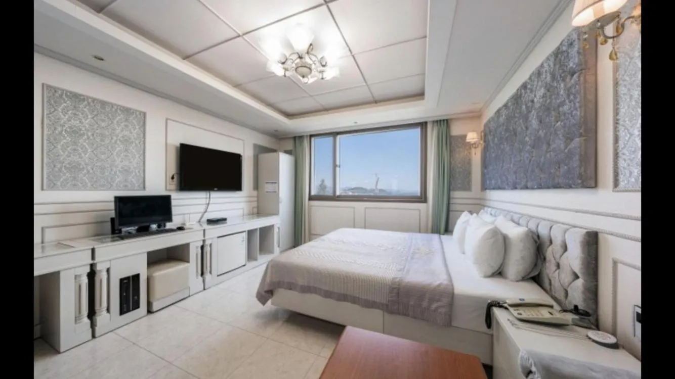 Bed in Yeosu Beach Hotel