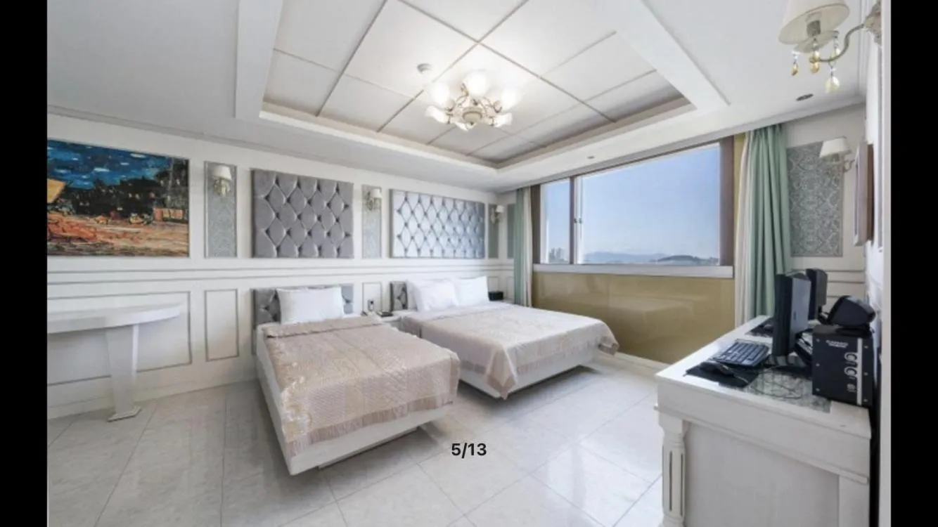 Bed in Yeosu Beach Hotel