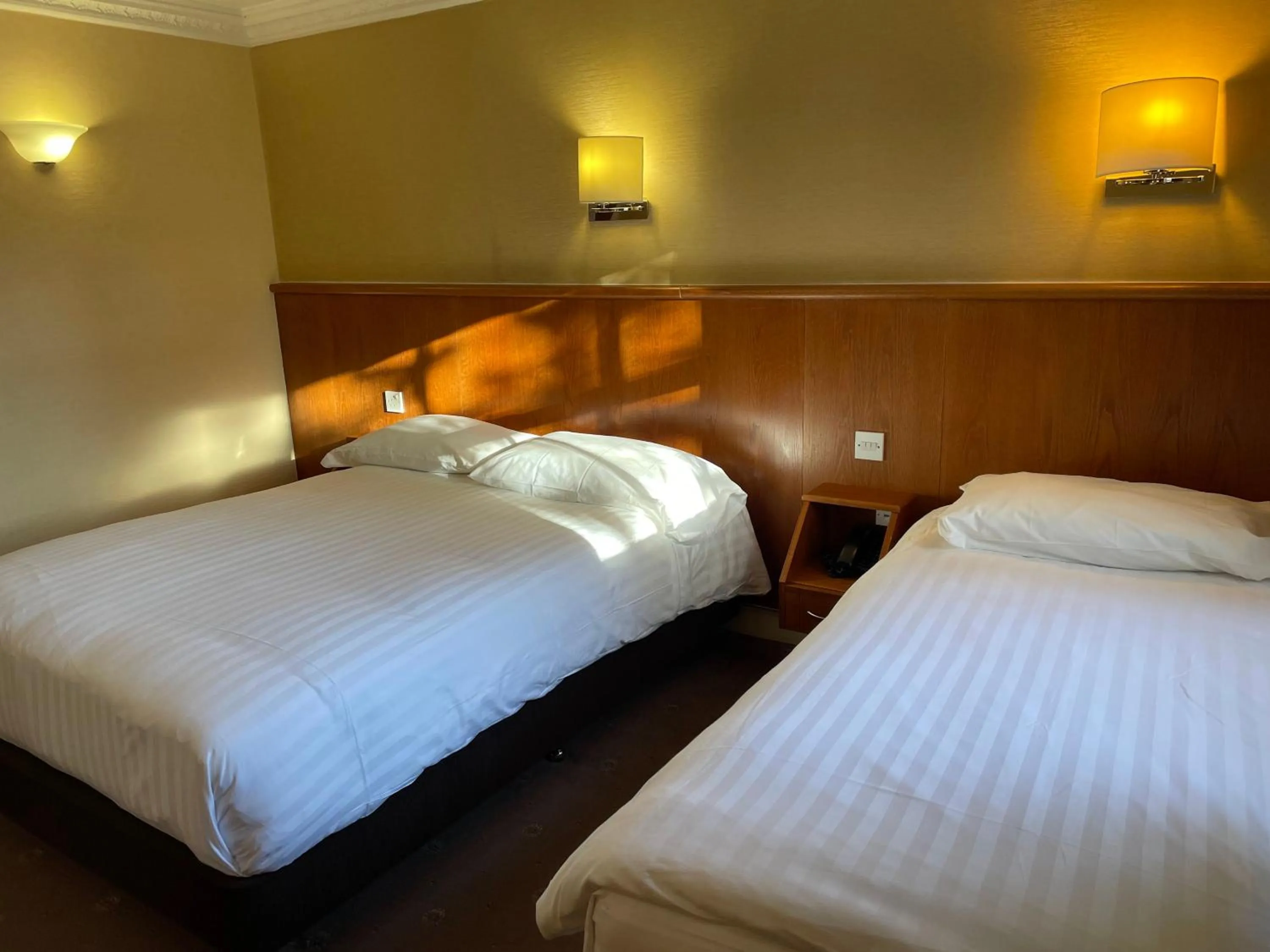 Bed in Orchard Hotel