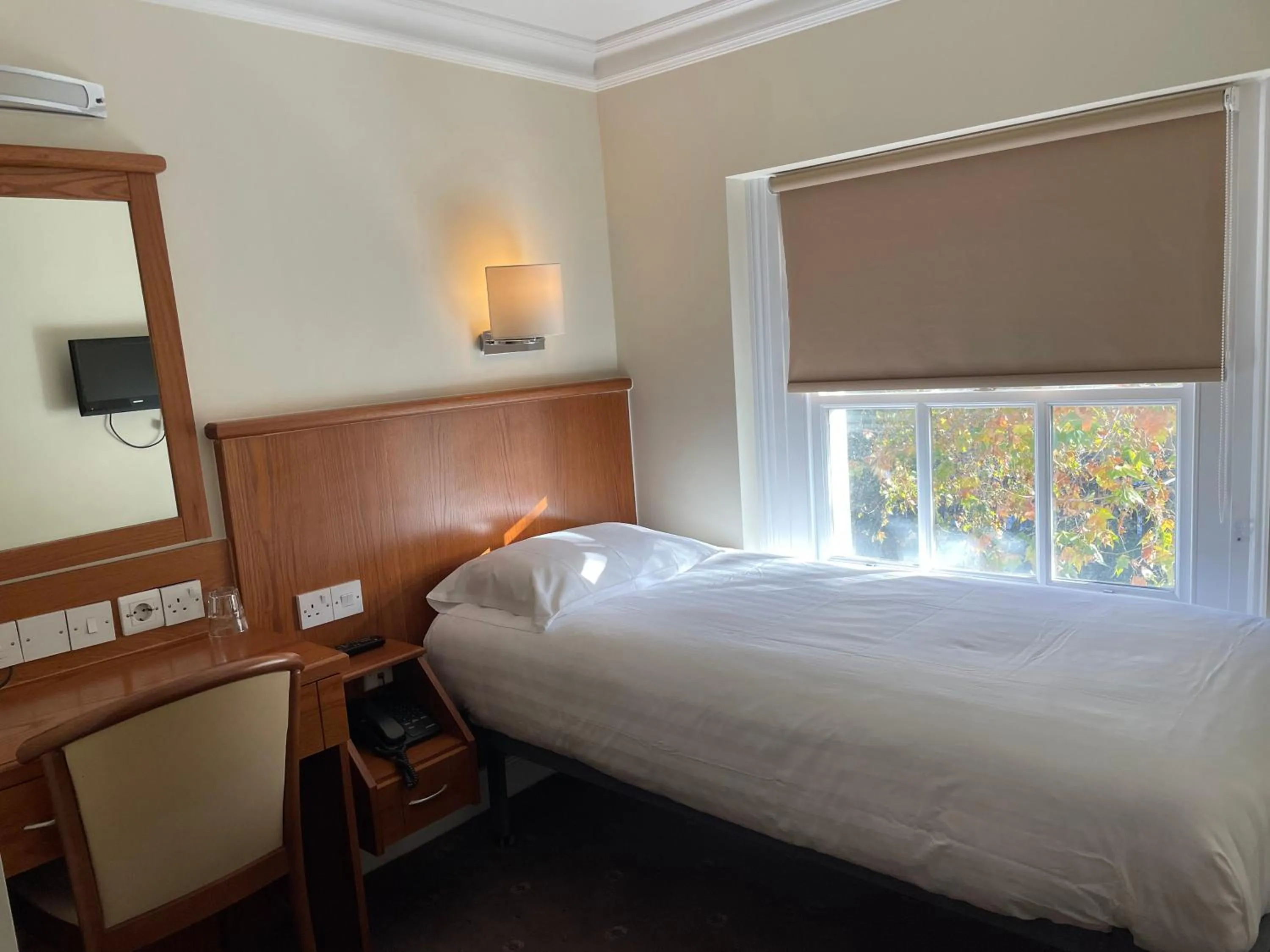 Bed in Orchard Hotel