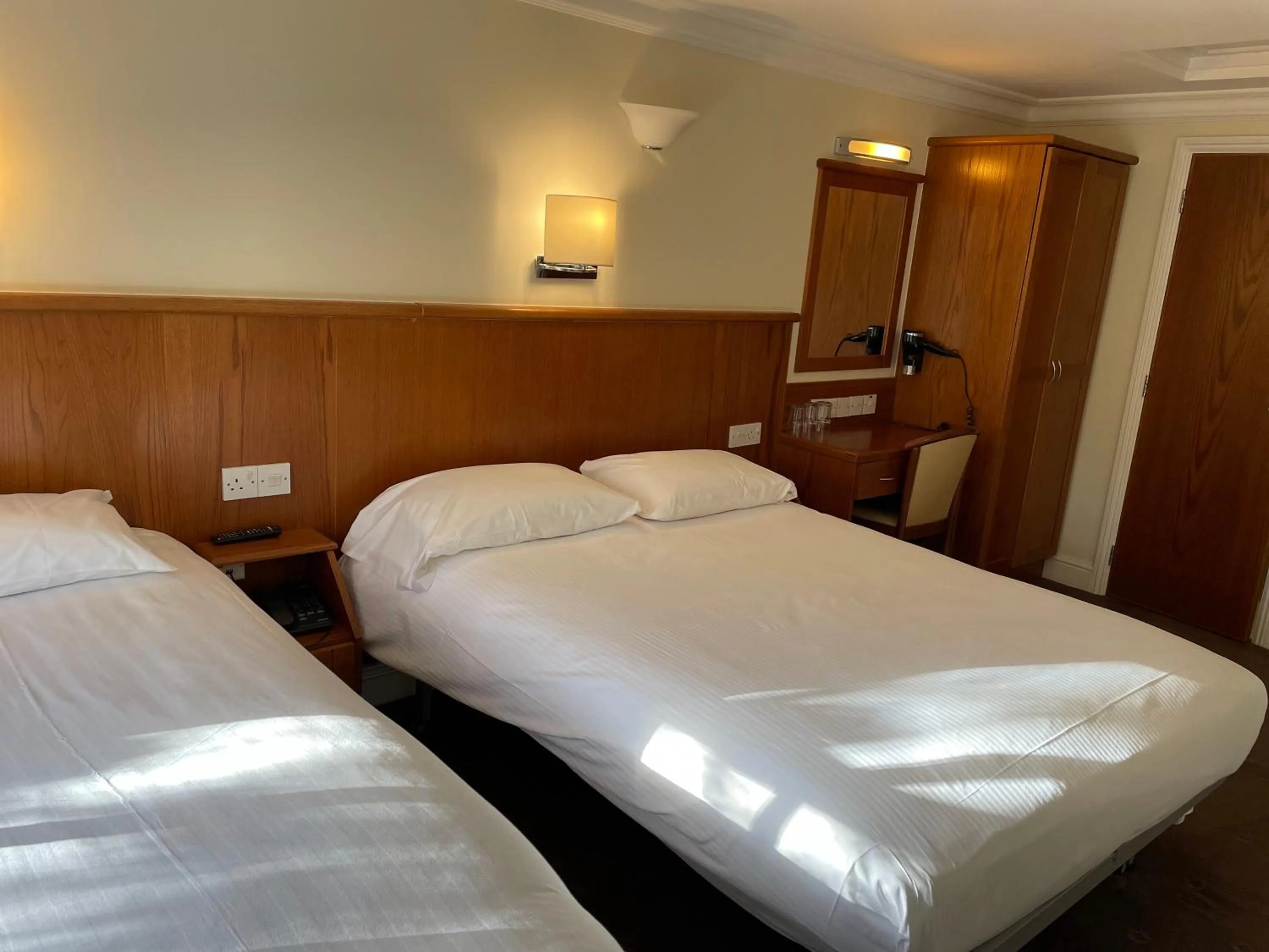 Bed in Orchard Hotel