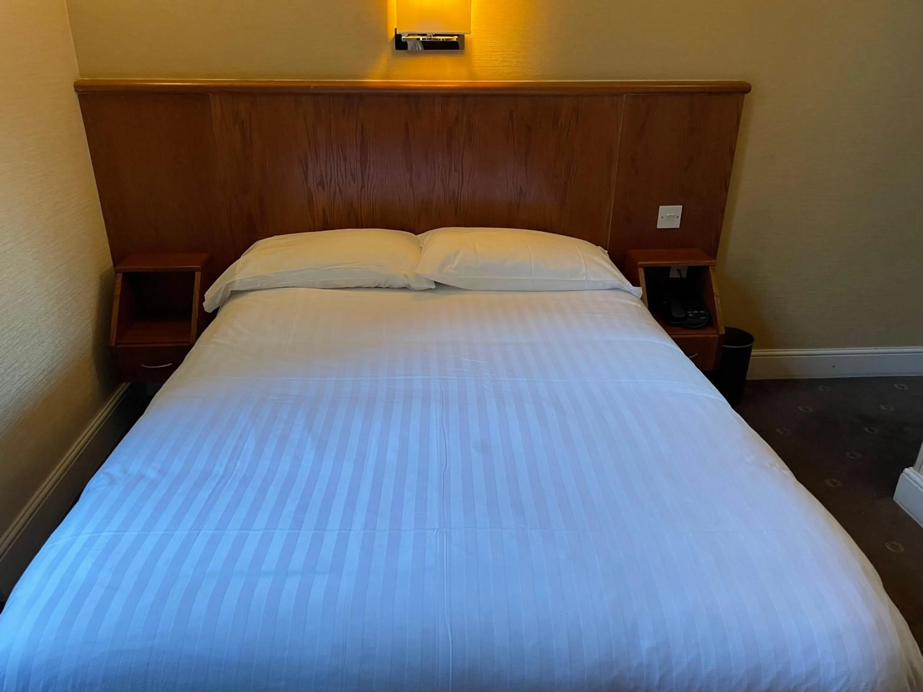 Bed in Orchard Hotel