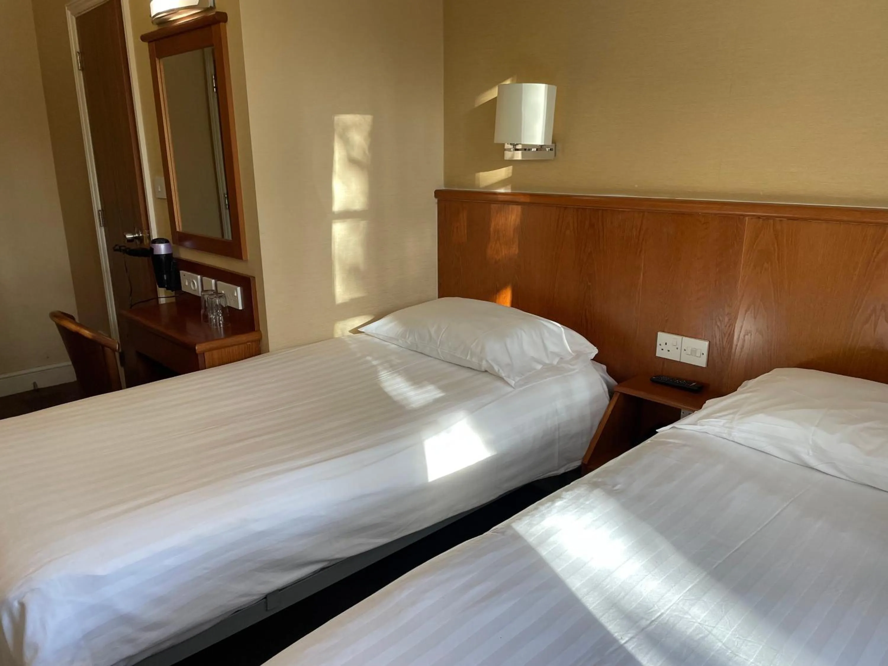 Bed in Orchard Hotel