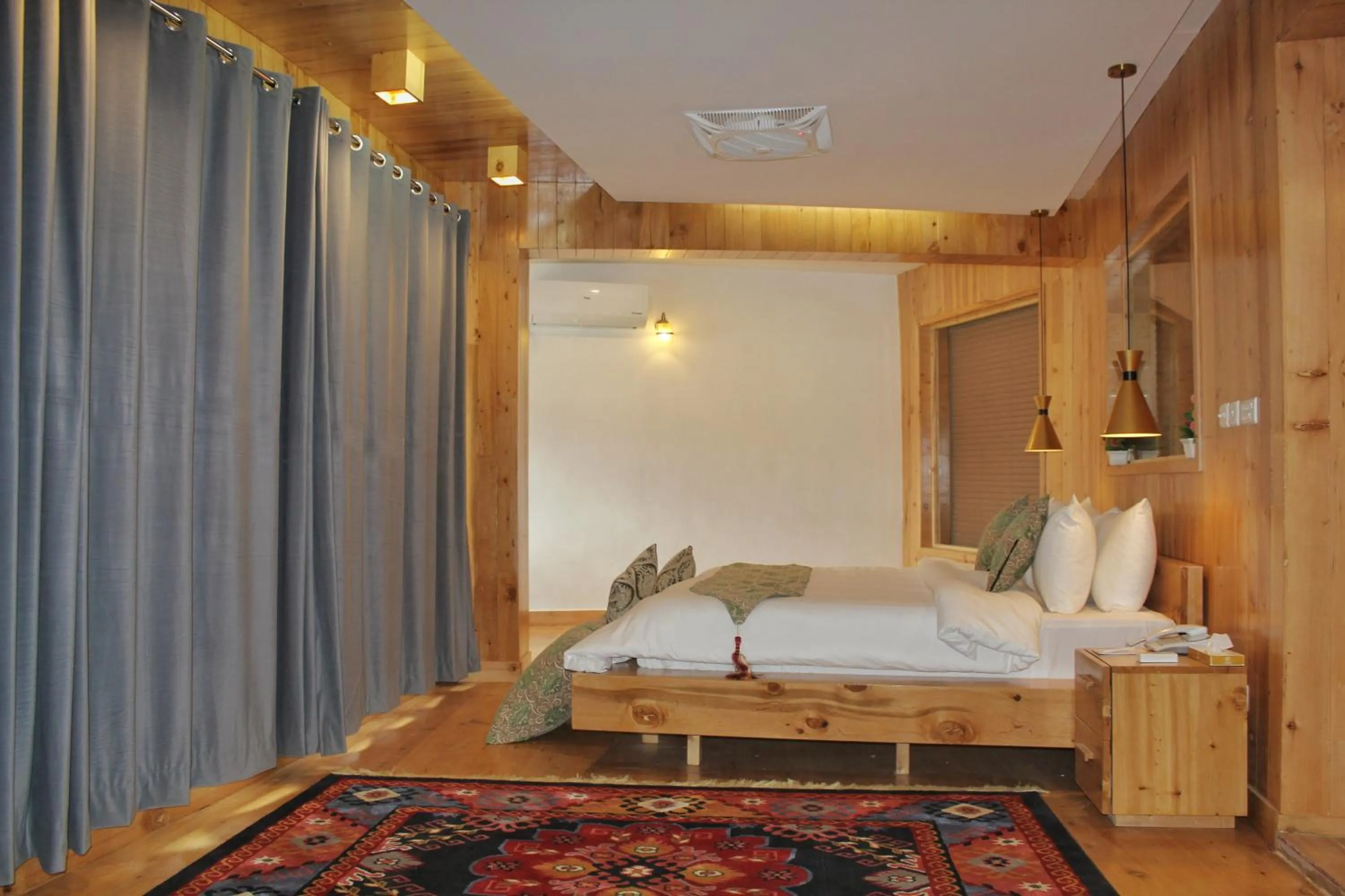 Photo of the whole room, Bed in Famree Resort Hunza