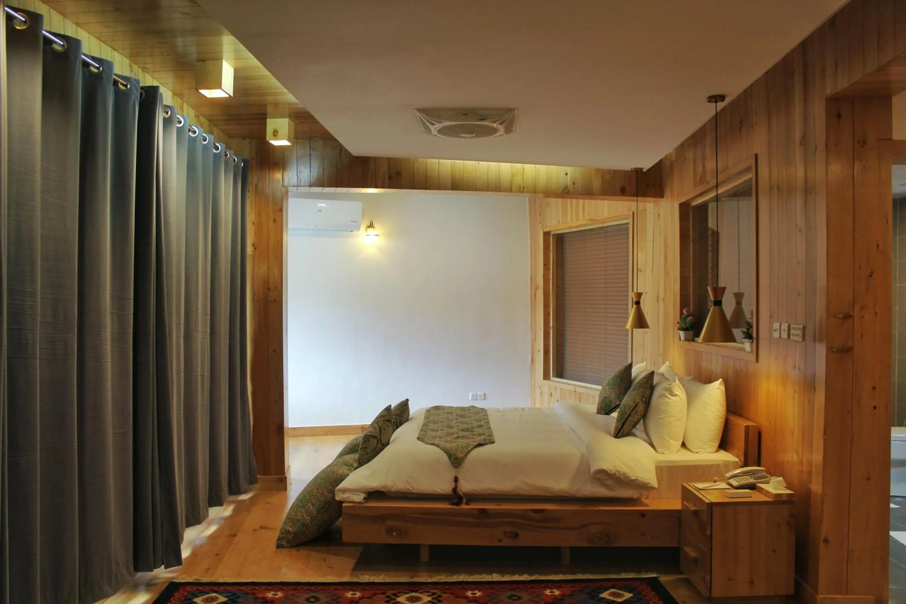 Photo of the whole room, Bed in Famree Resort Hunza