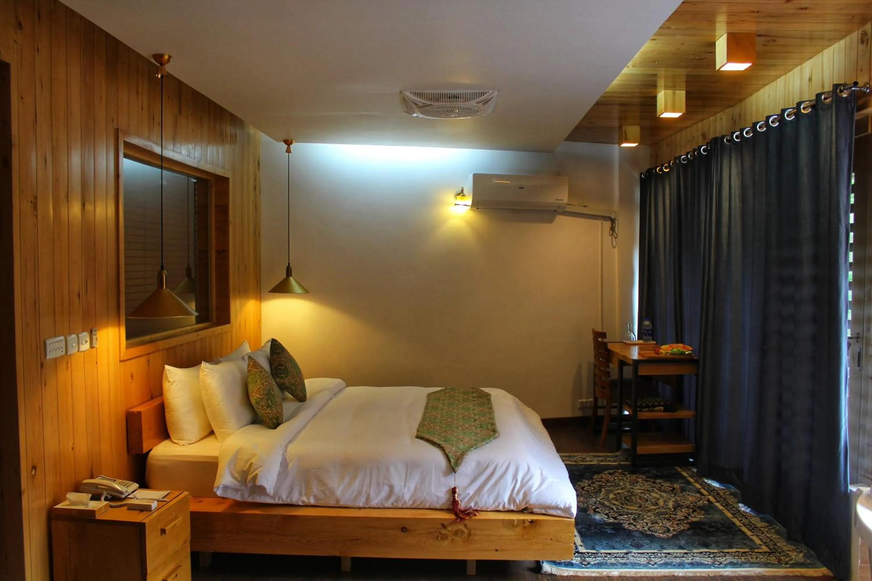 Photo of the whole room, Bed in Famree Resort Hunza