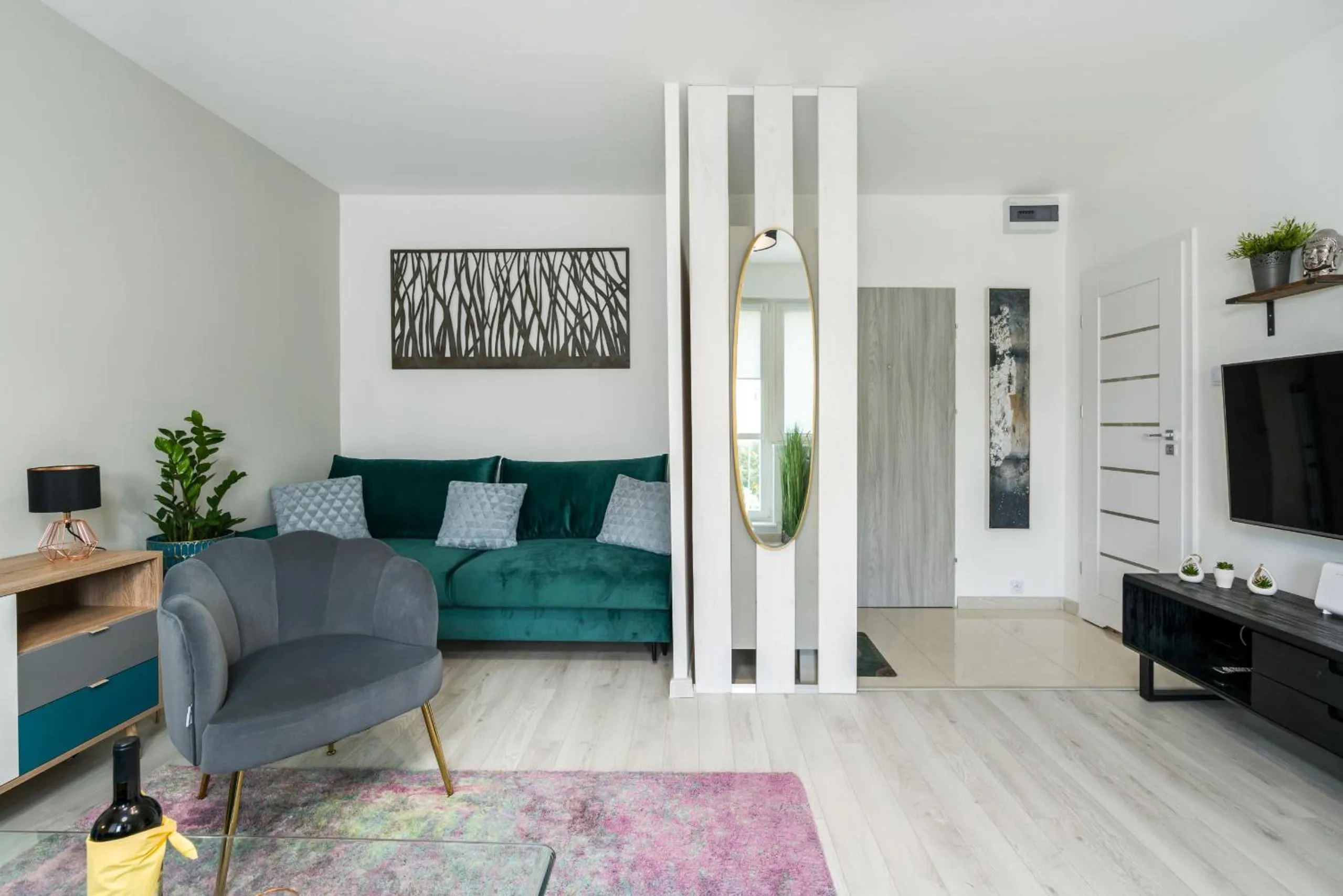 Communal lounge/ TV room in Apartments Poznań Keplera by Noclegi Renters