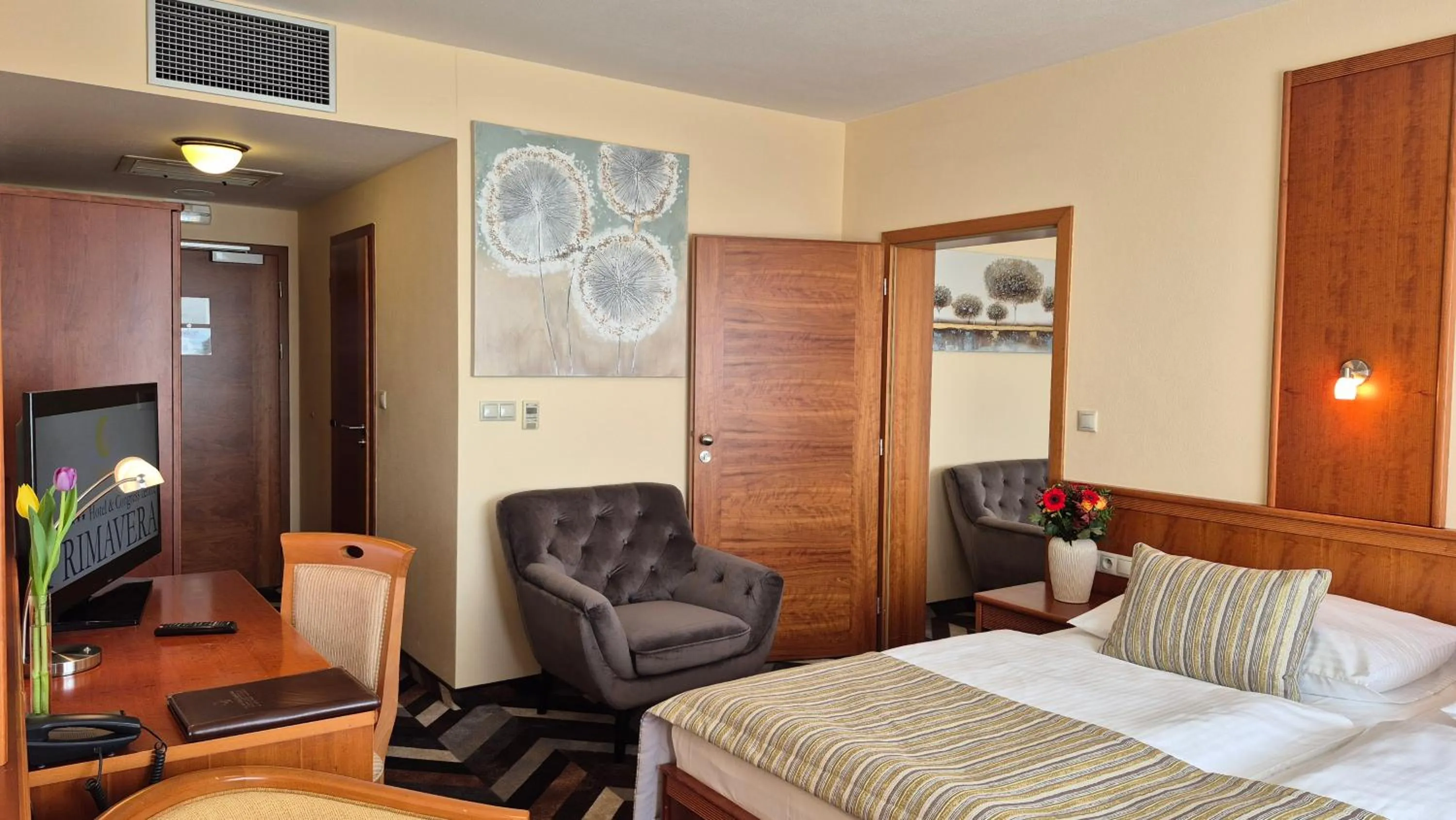 Bed in PRIMAVERA Hotel & Congress centre