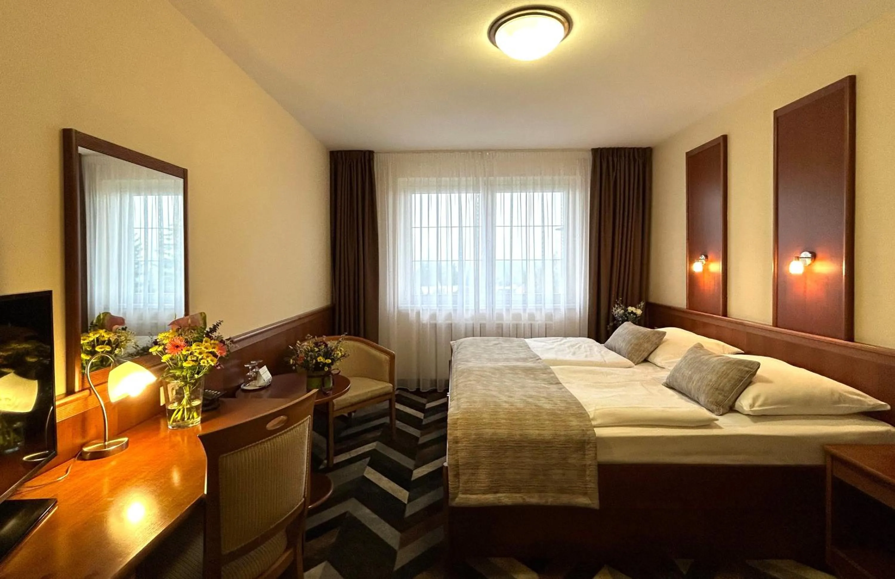 Bed in PRIMAVERA Hotel & Congress centre