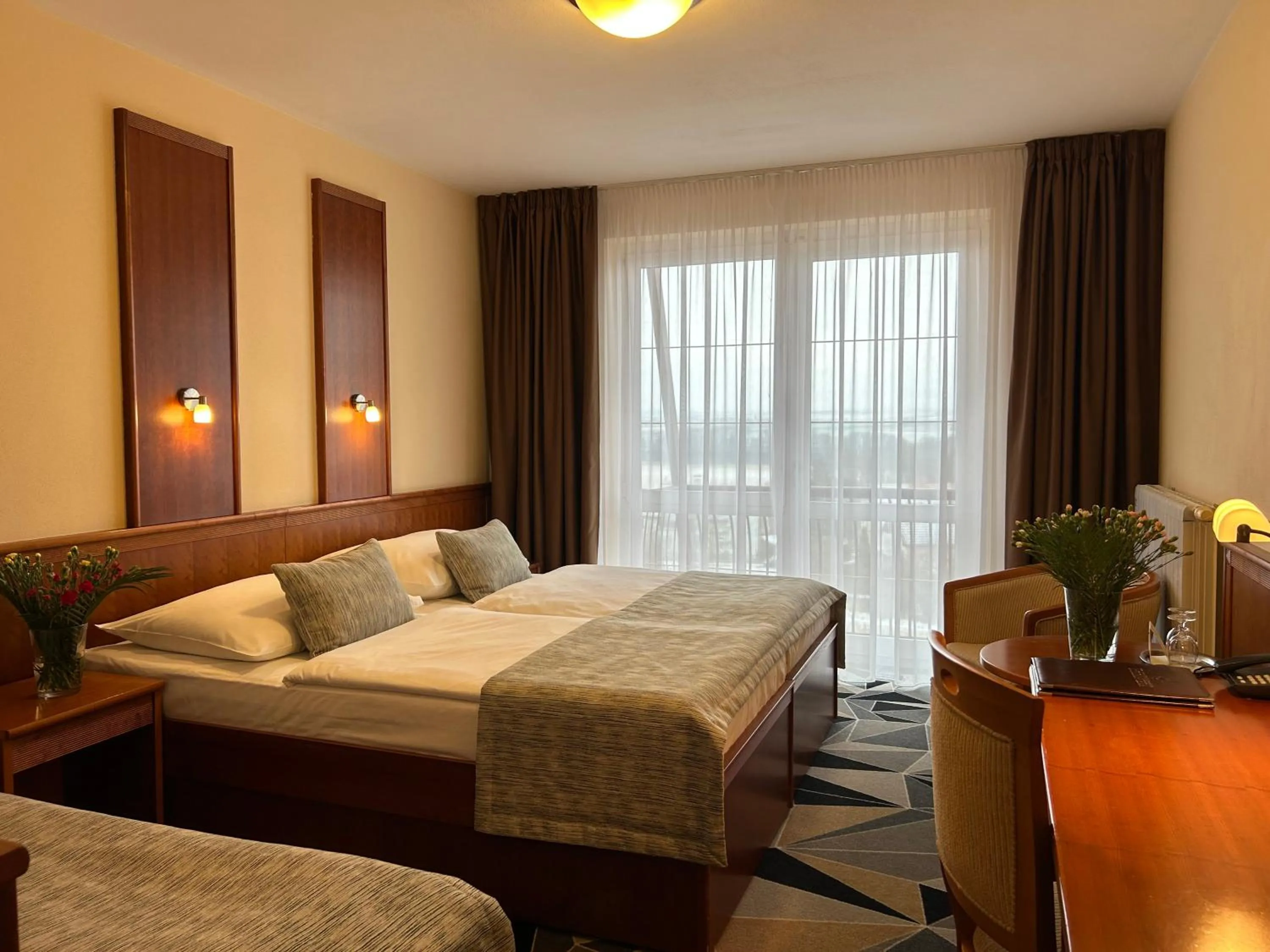 Bed in PRIMAVERA Hotel & Congress centre