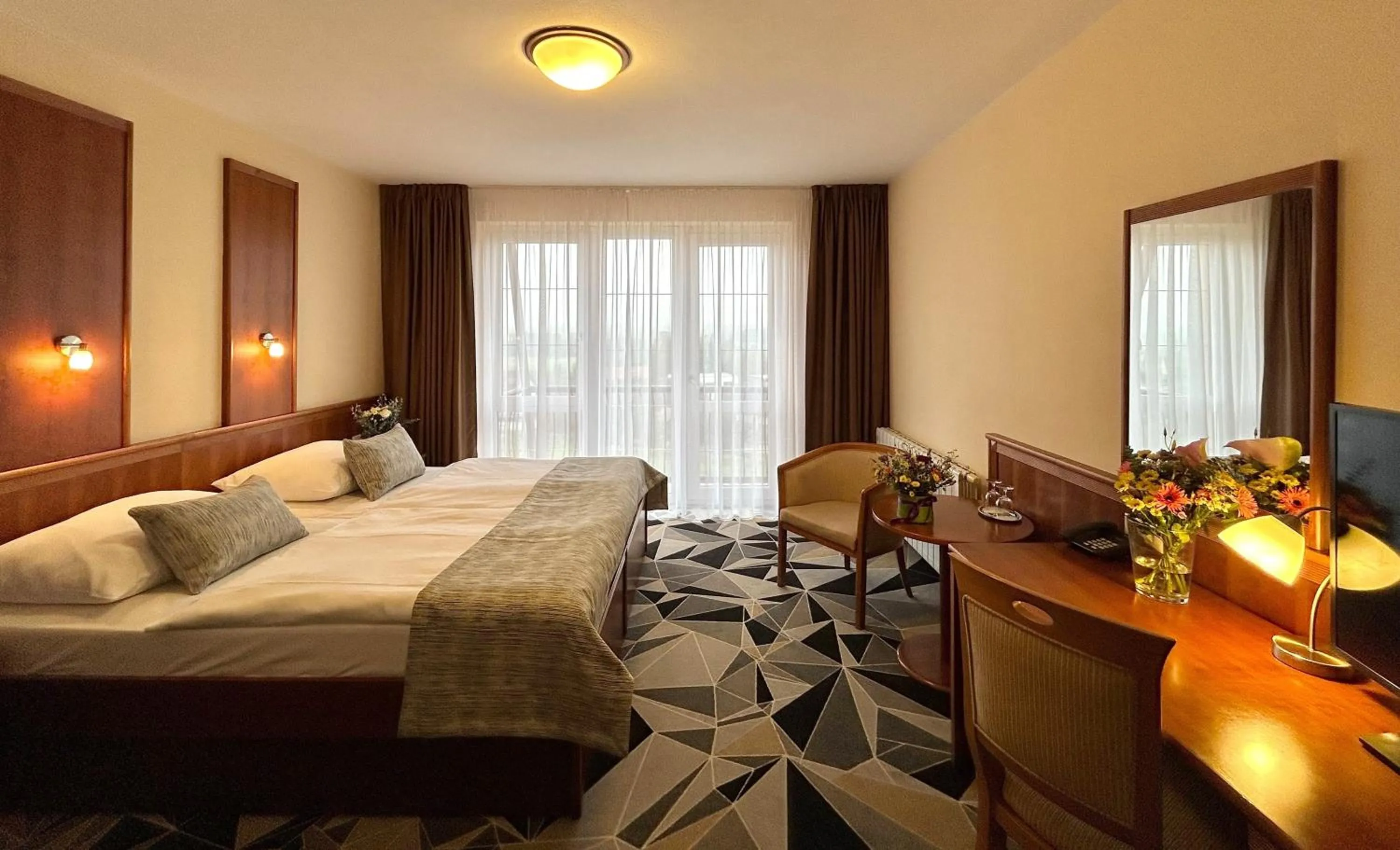 Bed in PRIMAVERA Hotel & Congress centre