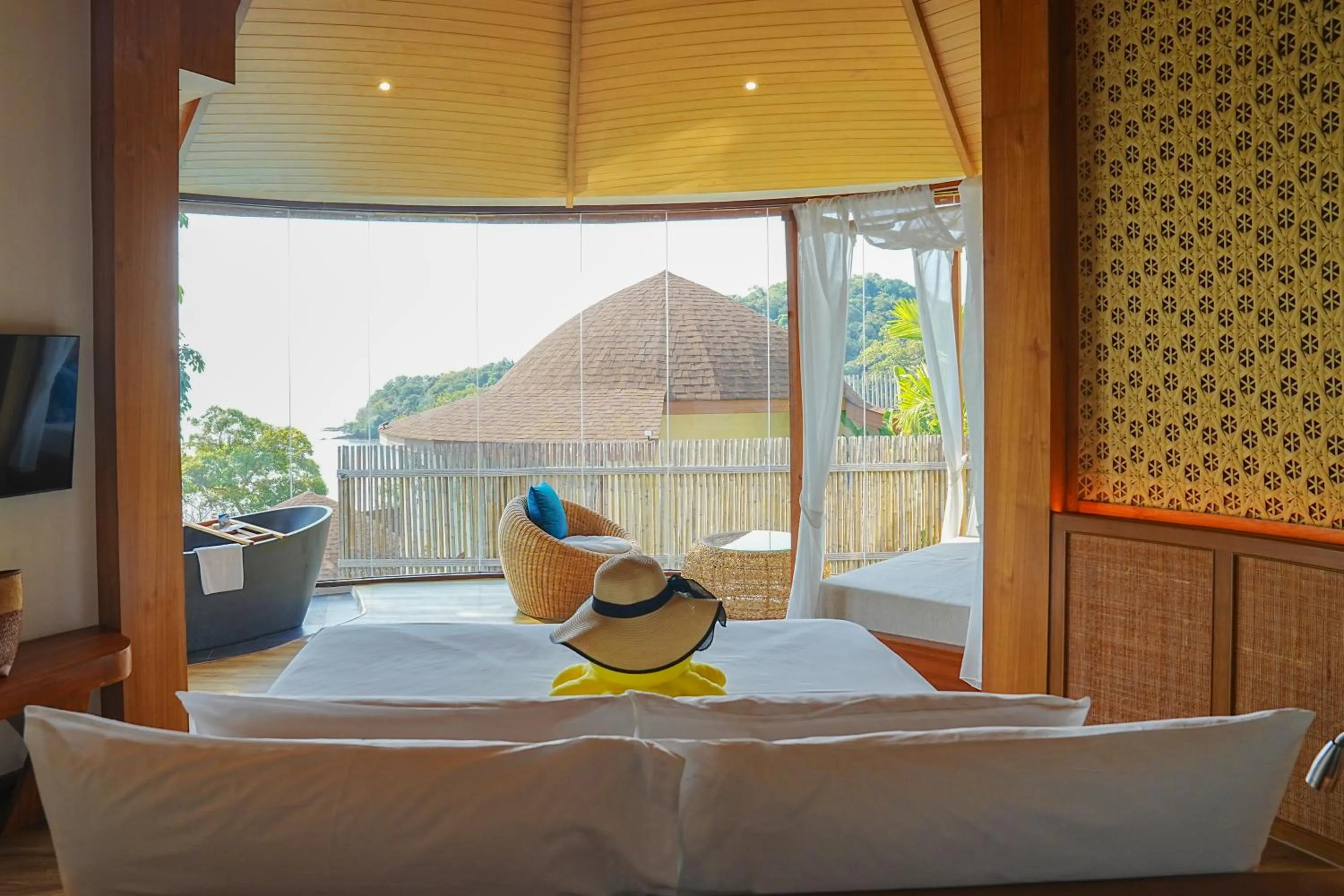 Bed in SINAE Phuket Luxury Hotel