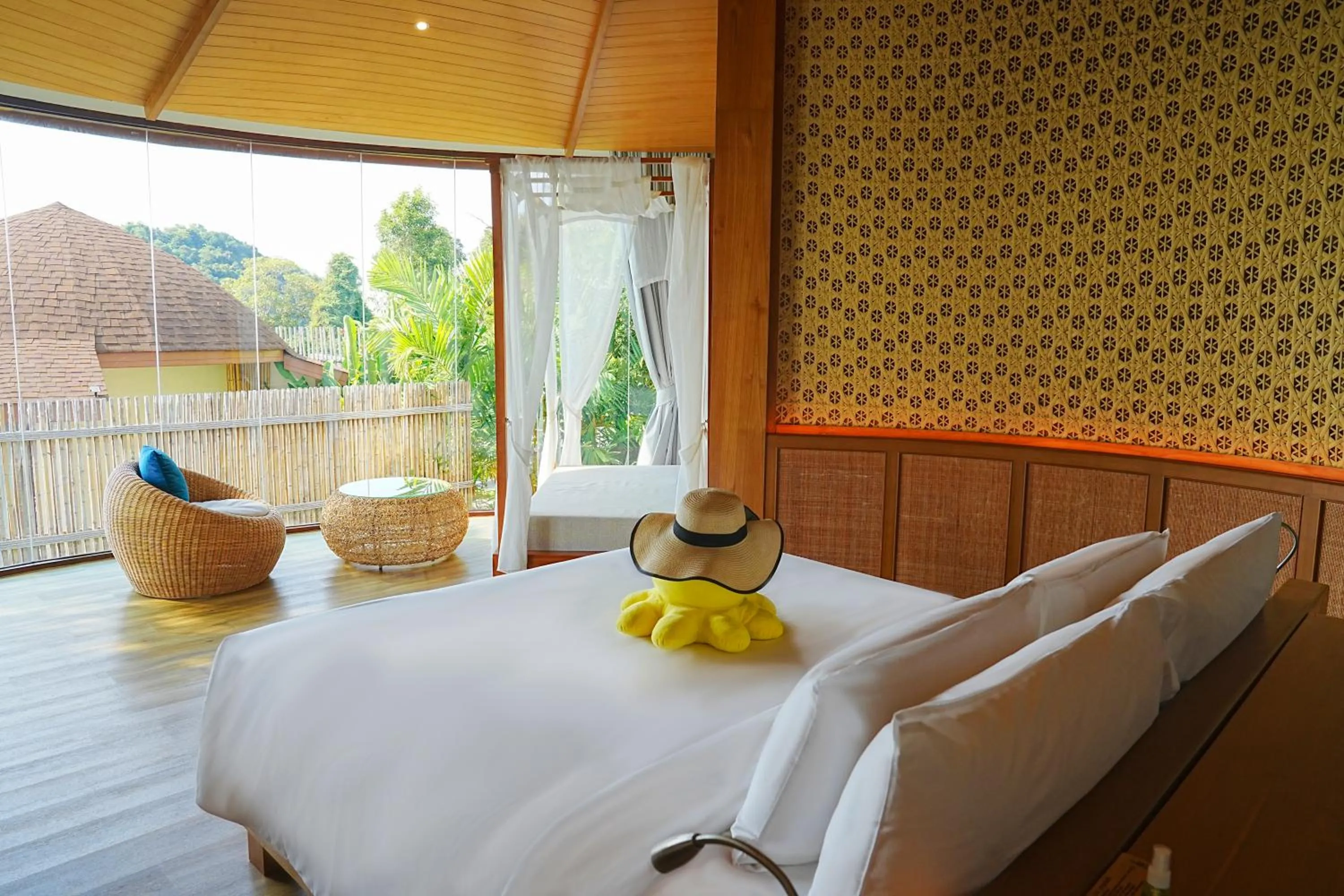 Bed in SINAE Phuket Luxury Hotel