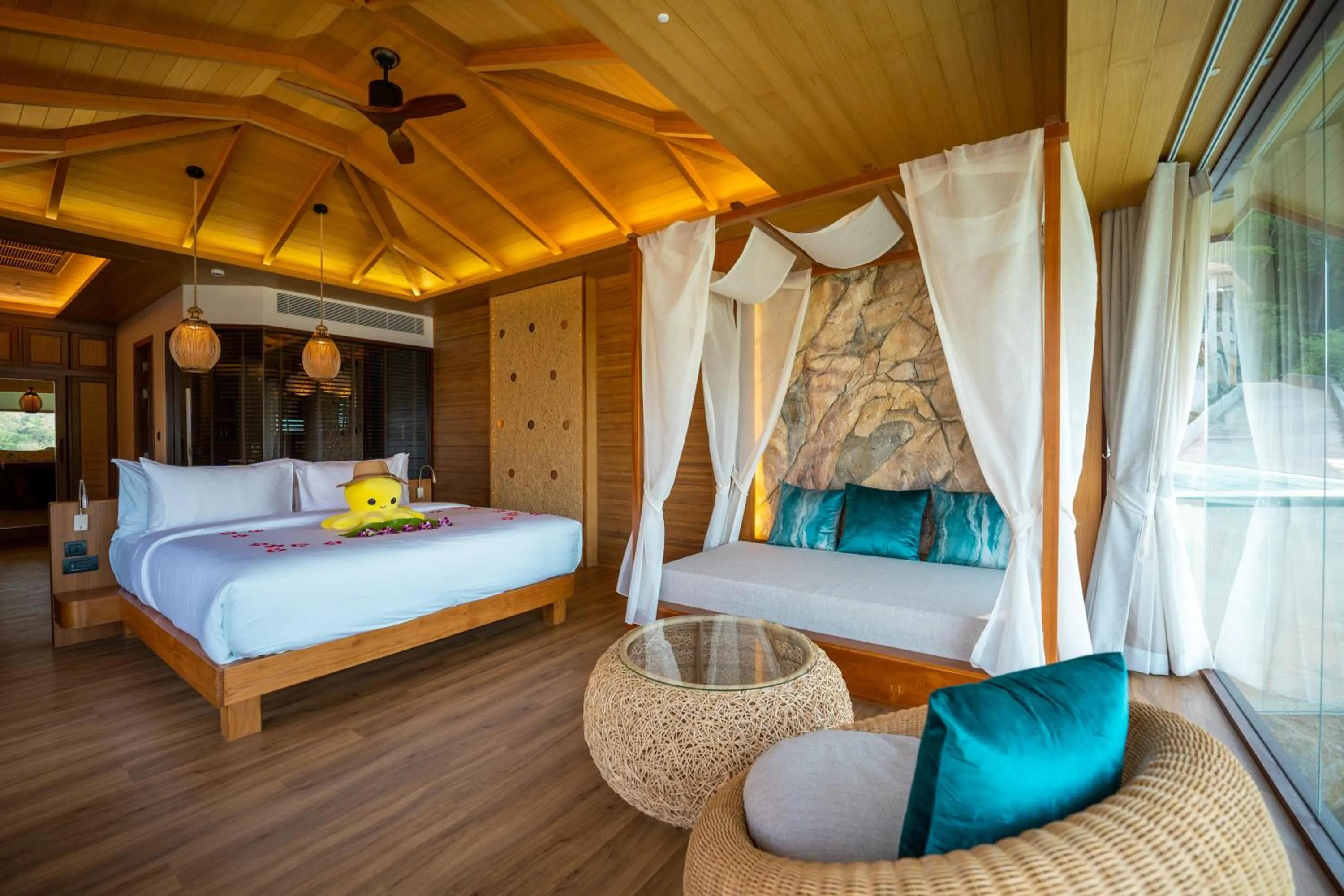 Bed in SINAE Phuket Luxury Hotel