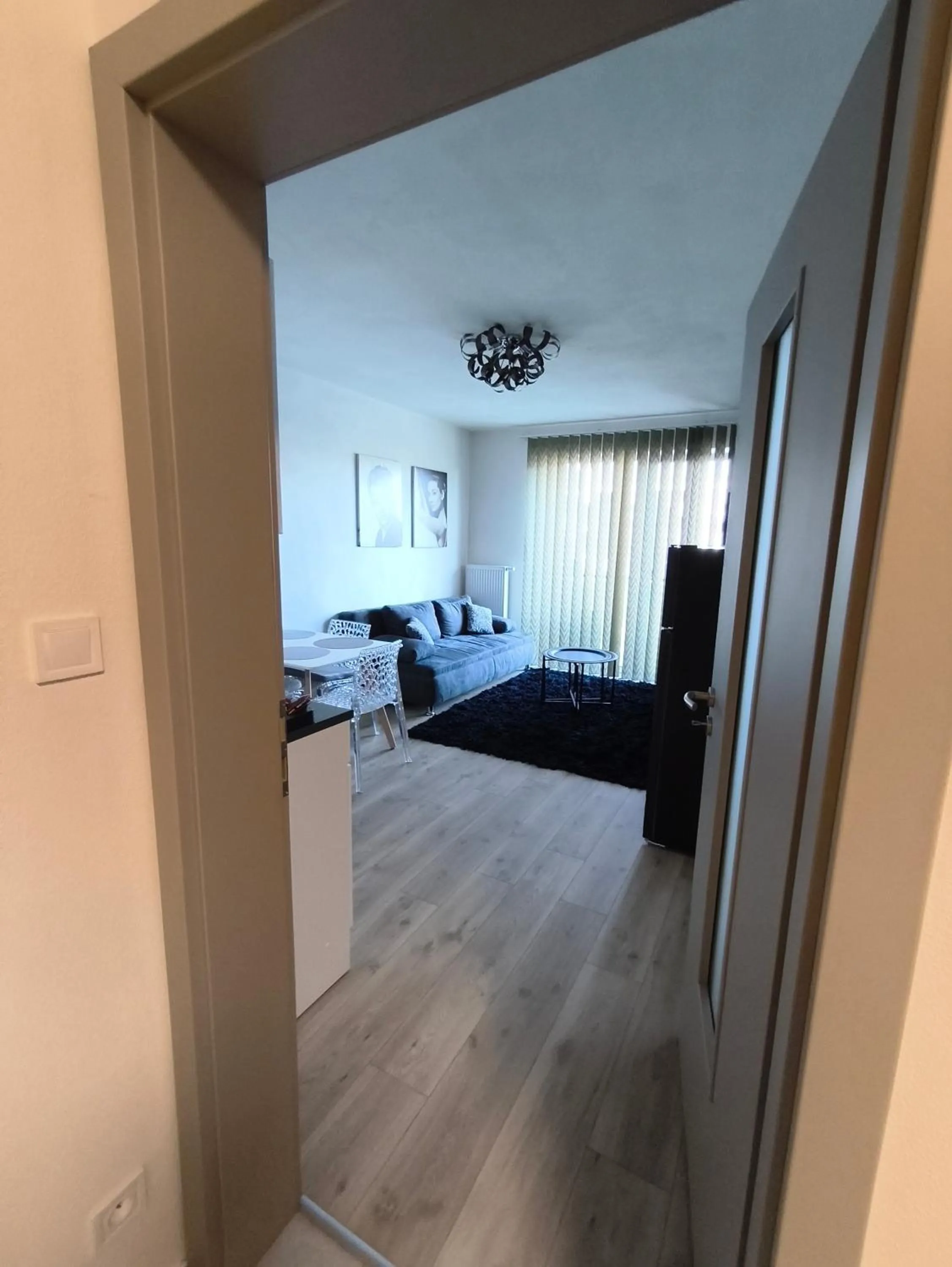 Living room, Bed in Hotel Plzeň