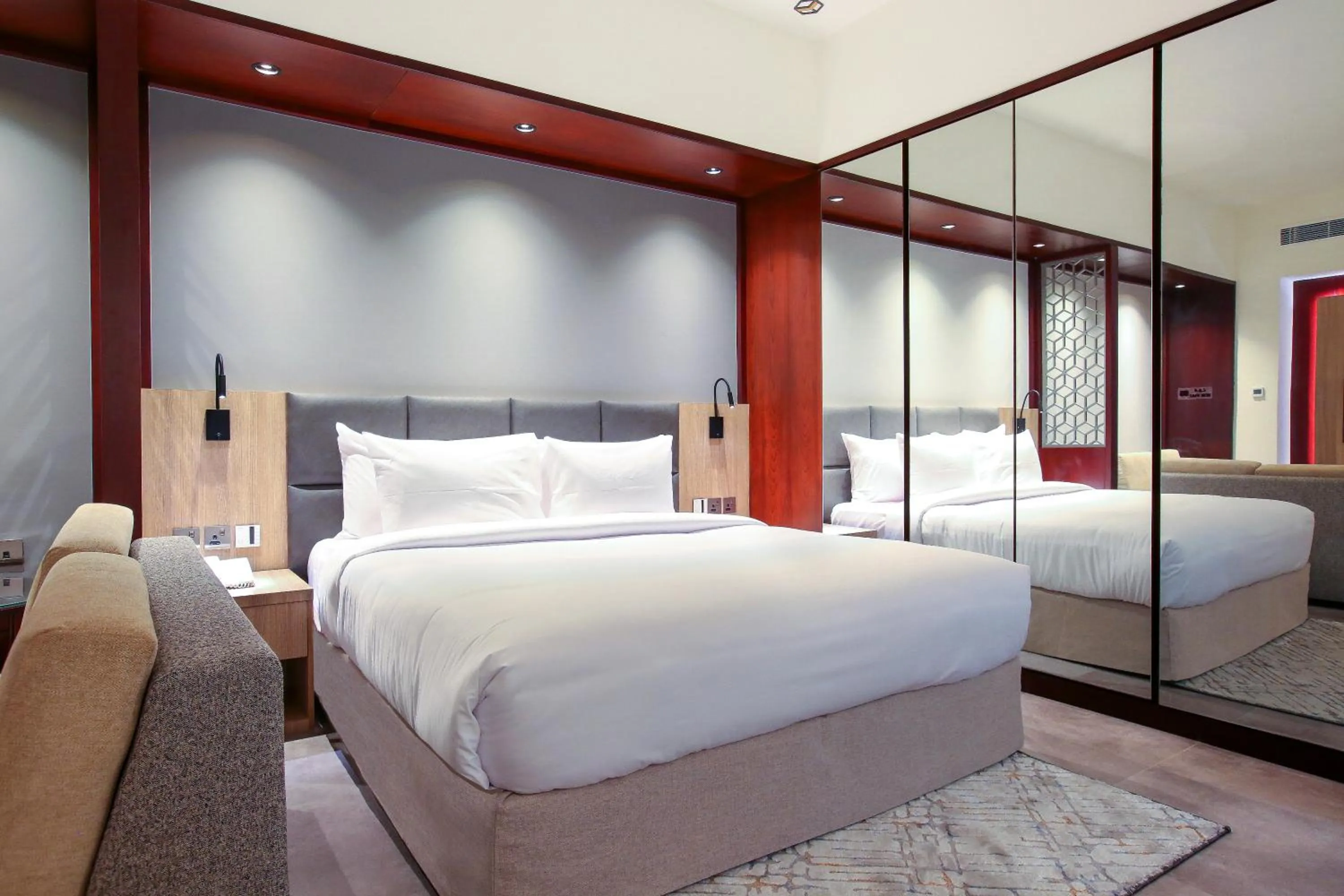 Bed in SITARA HOTEL APARTMENT