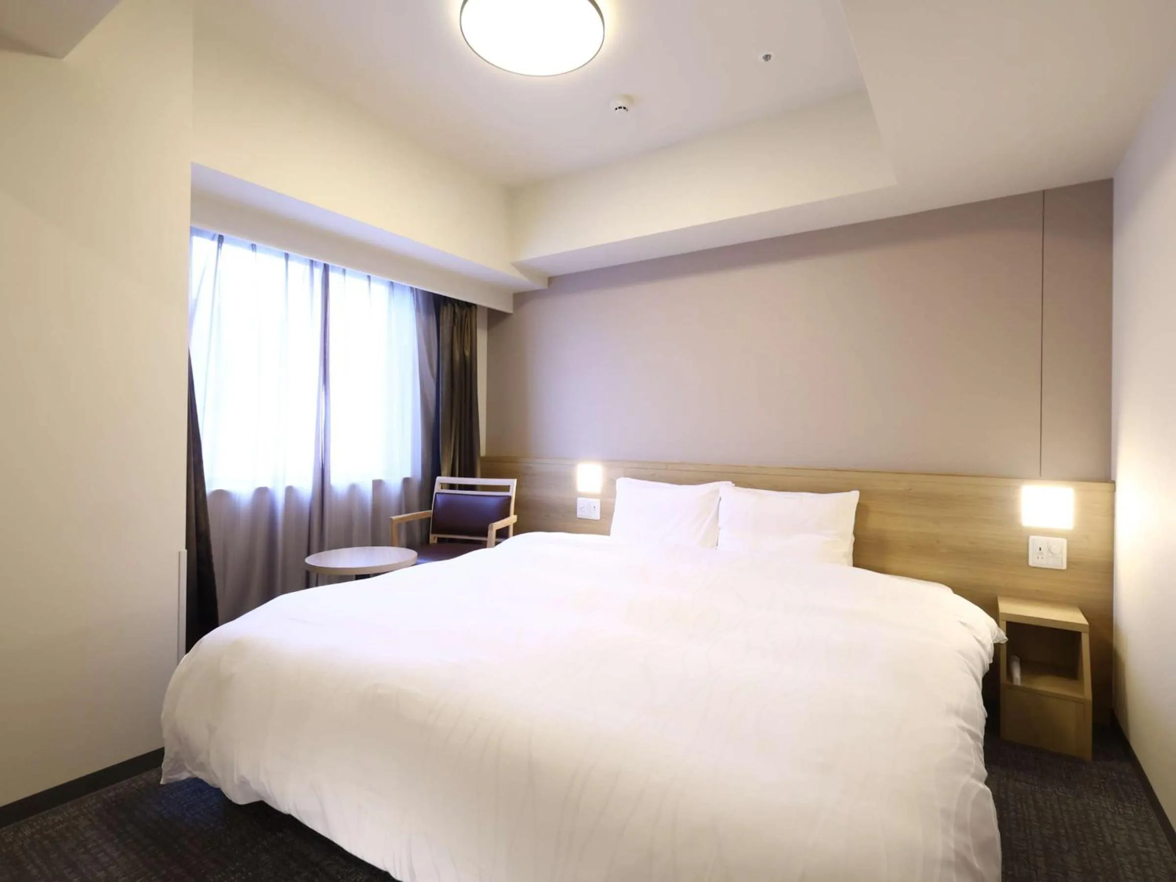 Bed in Dormy Inn Hiroshima Annex