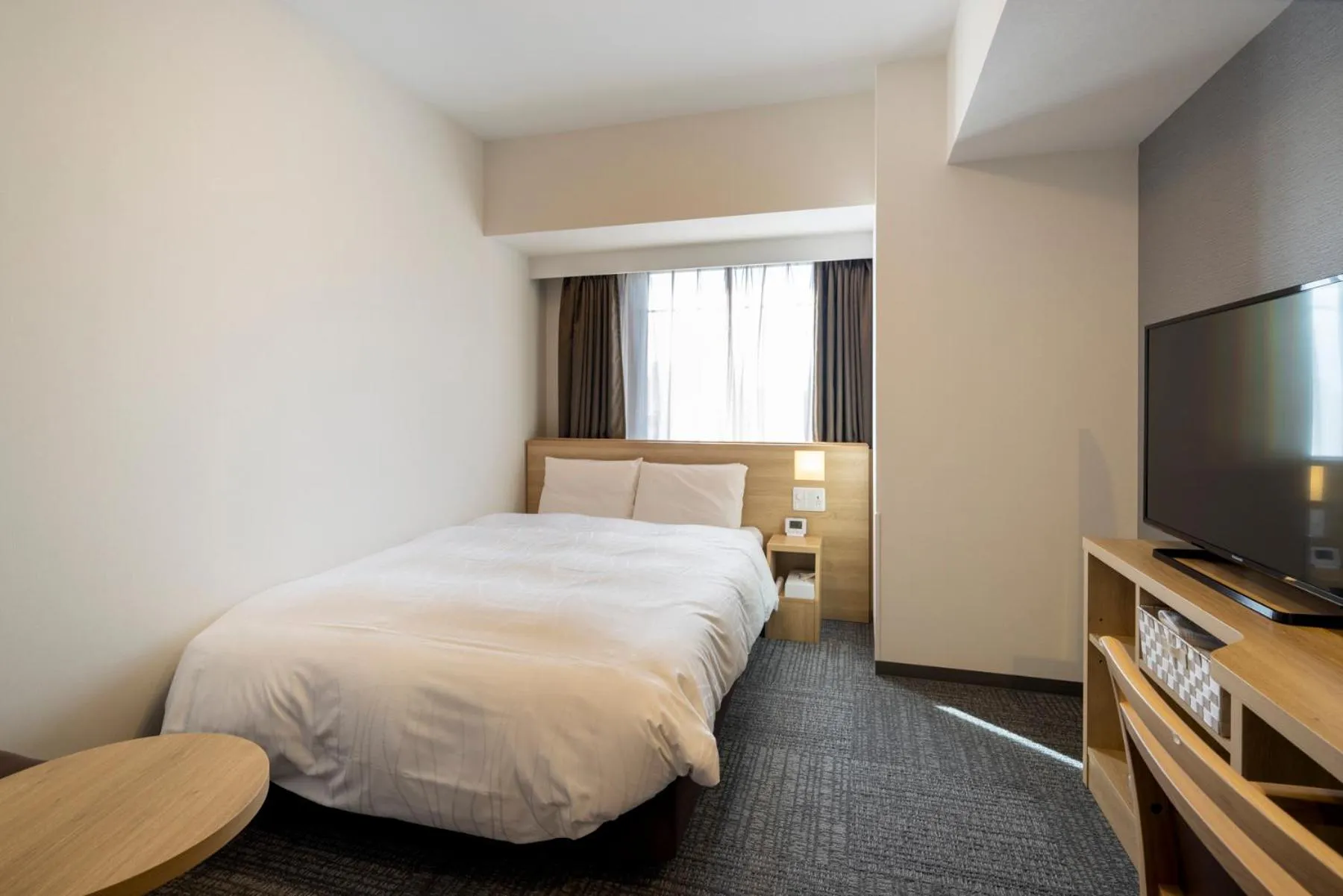 Bed in Dormy Inn Hiroshima Annex