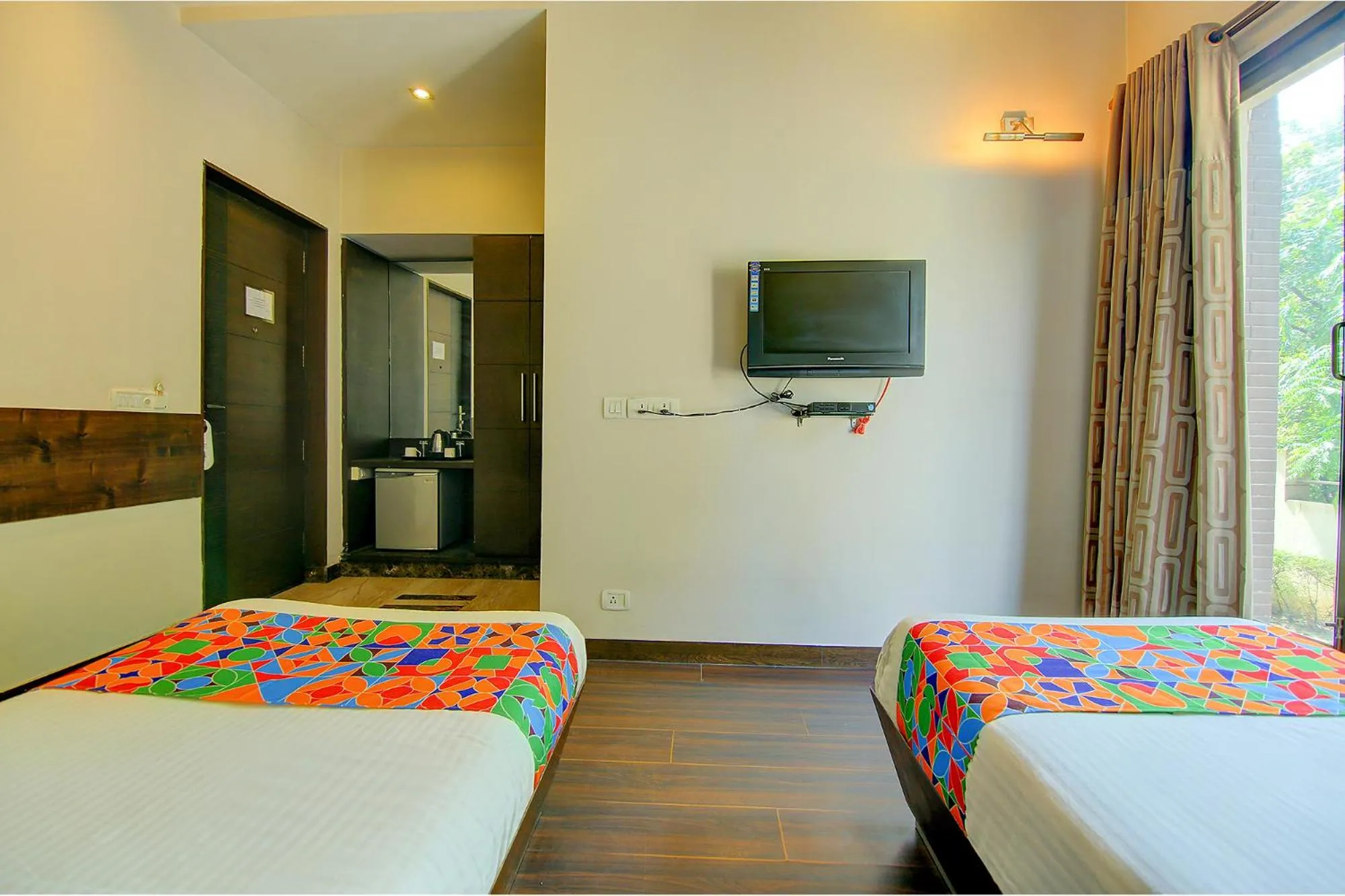 Bed in FabHotel Phoenix Hospitality Near DLF Cyber Hub & Metro, Gurugram