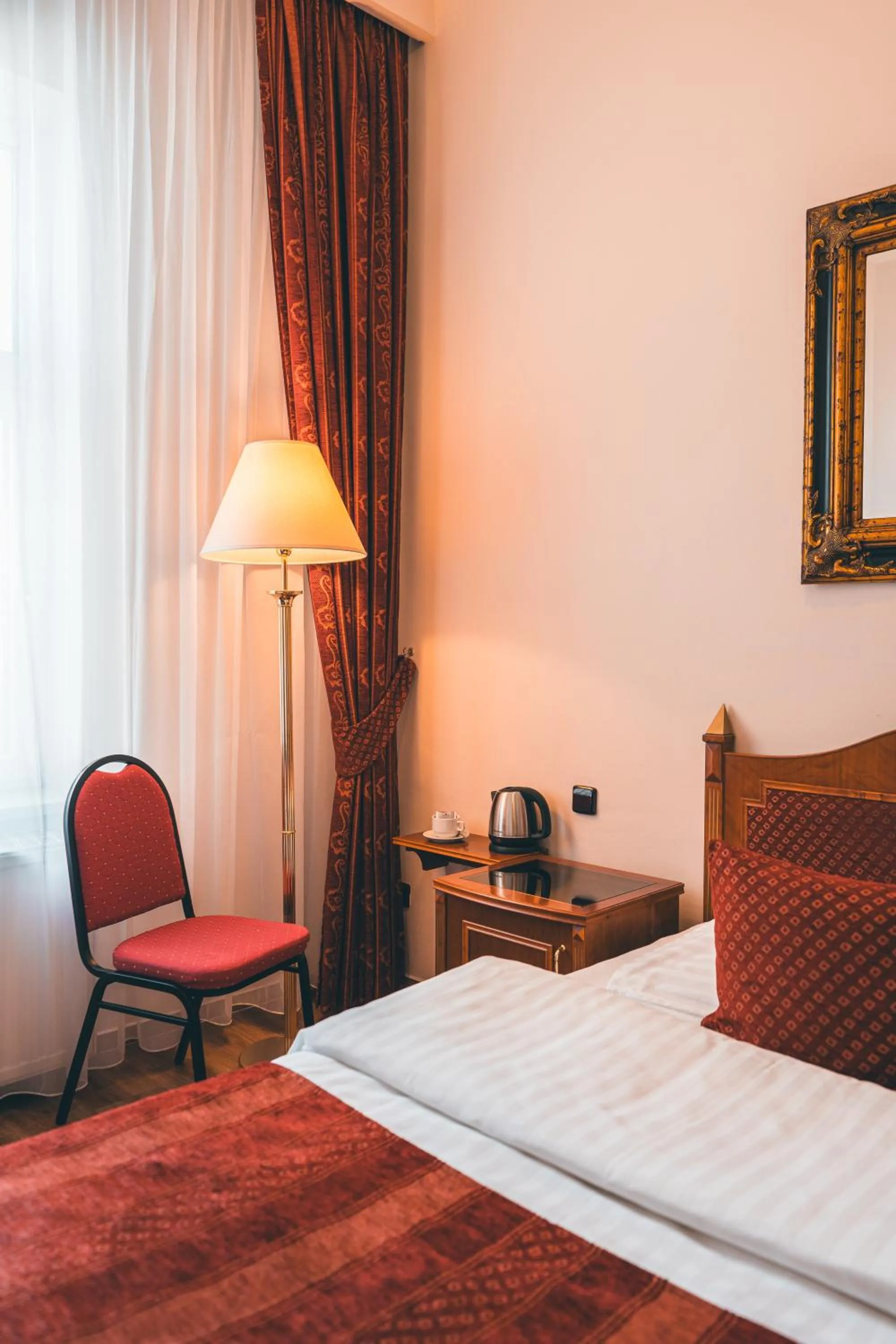 Bed in Hotel Ariston Prague