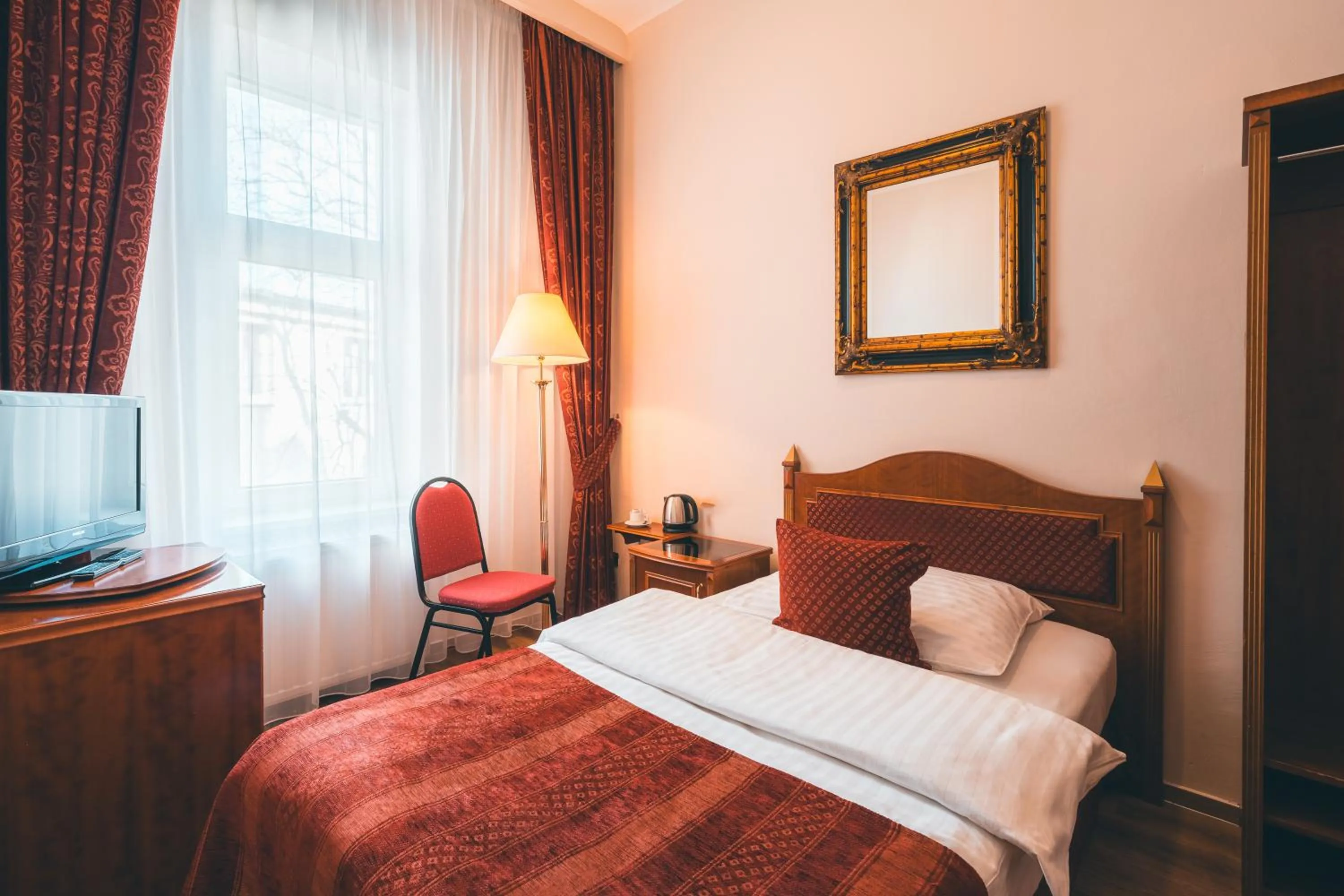 Bed in Hotel Ariston Prague