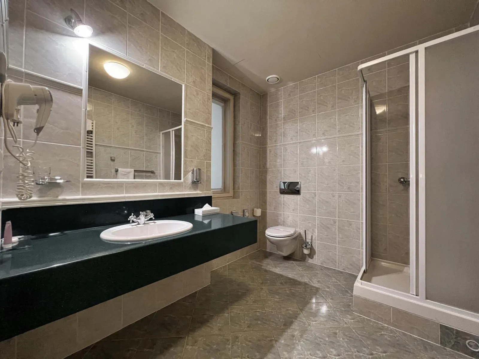 Bathroom in Elysee Hotel