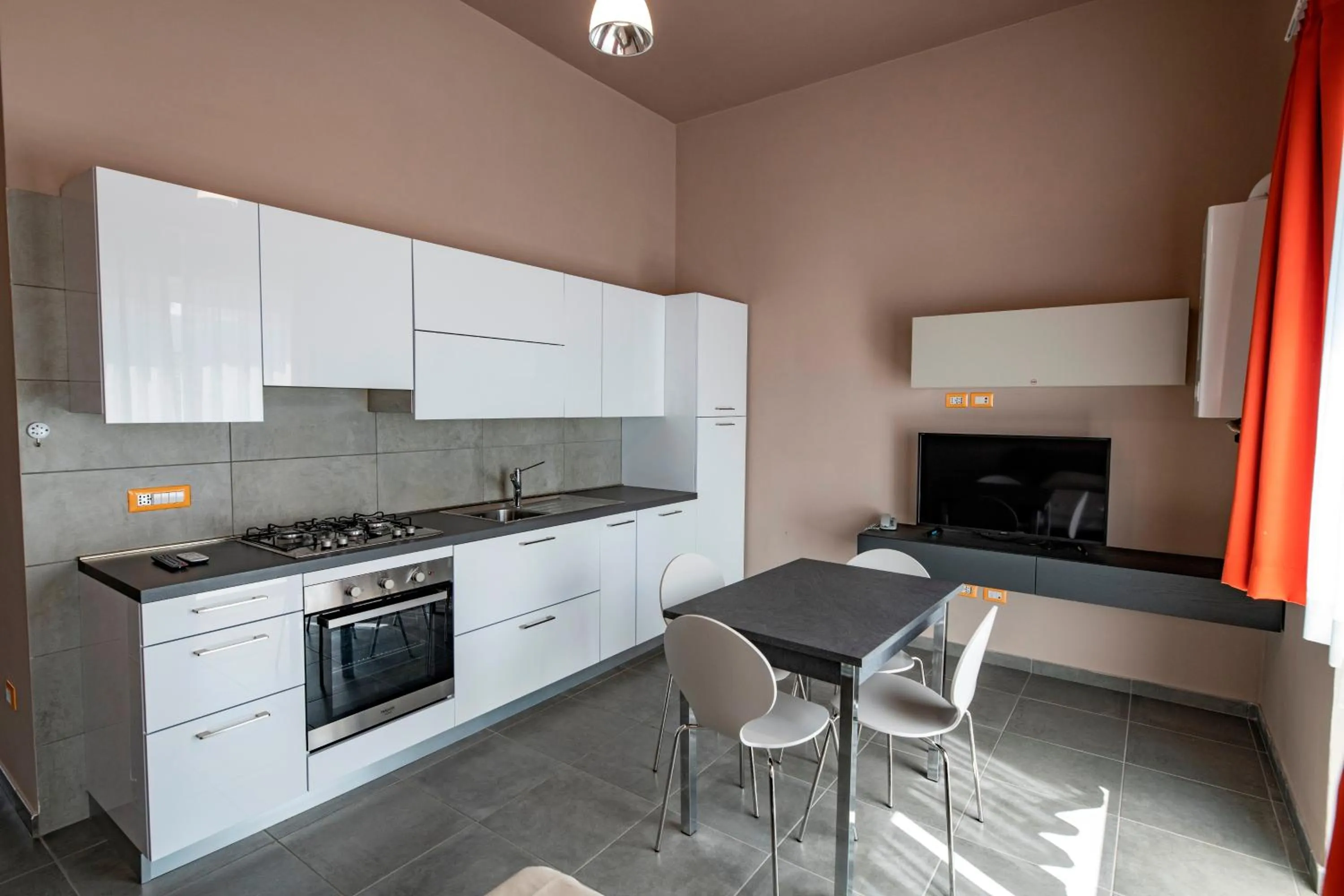 Kitchen or kitchenette in Eracle Hotel