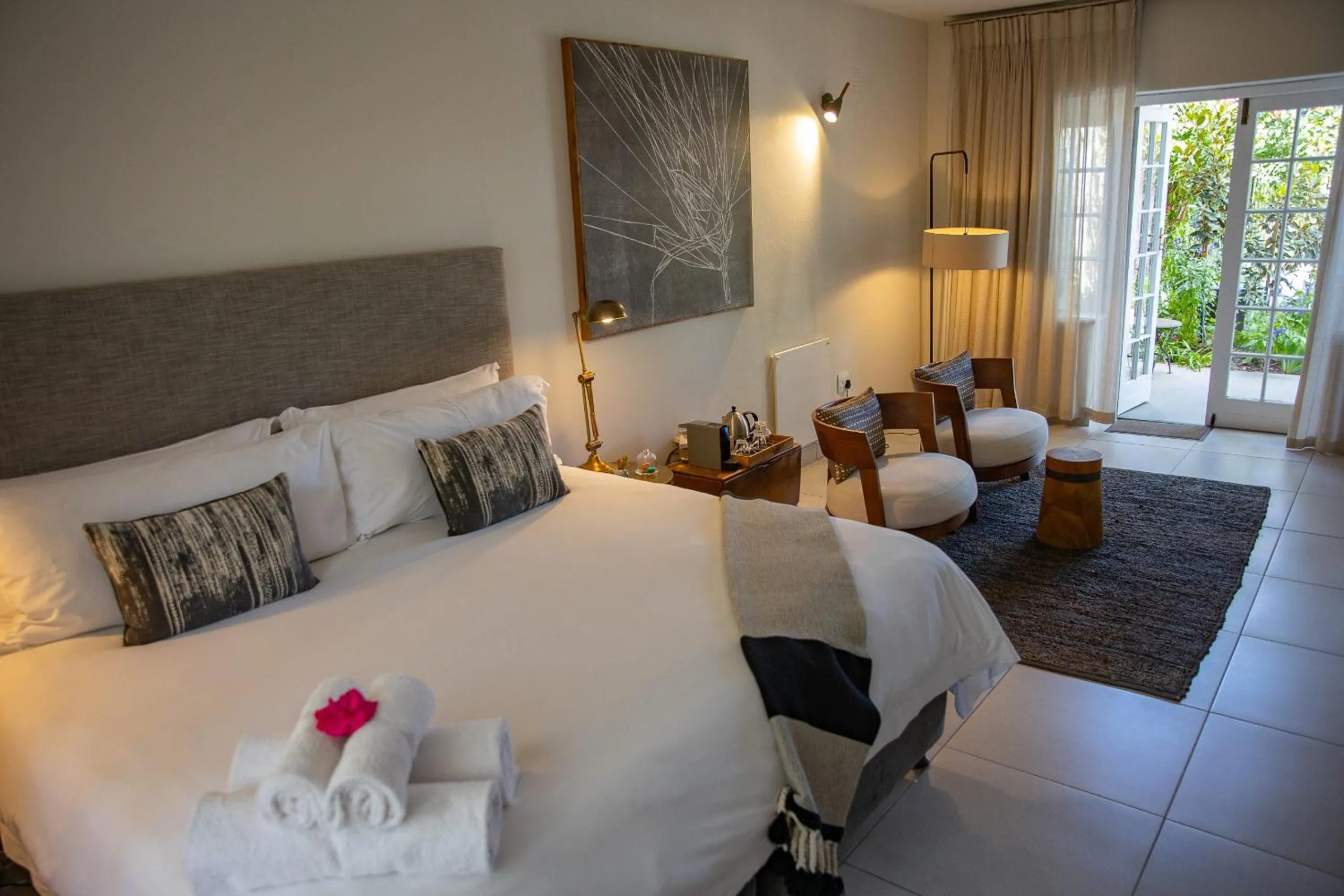 Seating area, Bed in Macaron Boutique Guest House