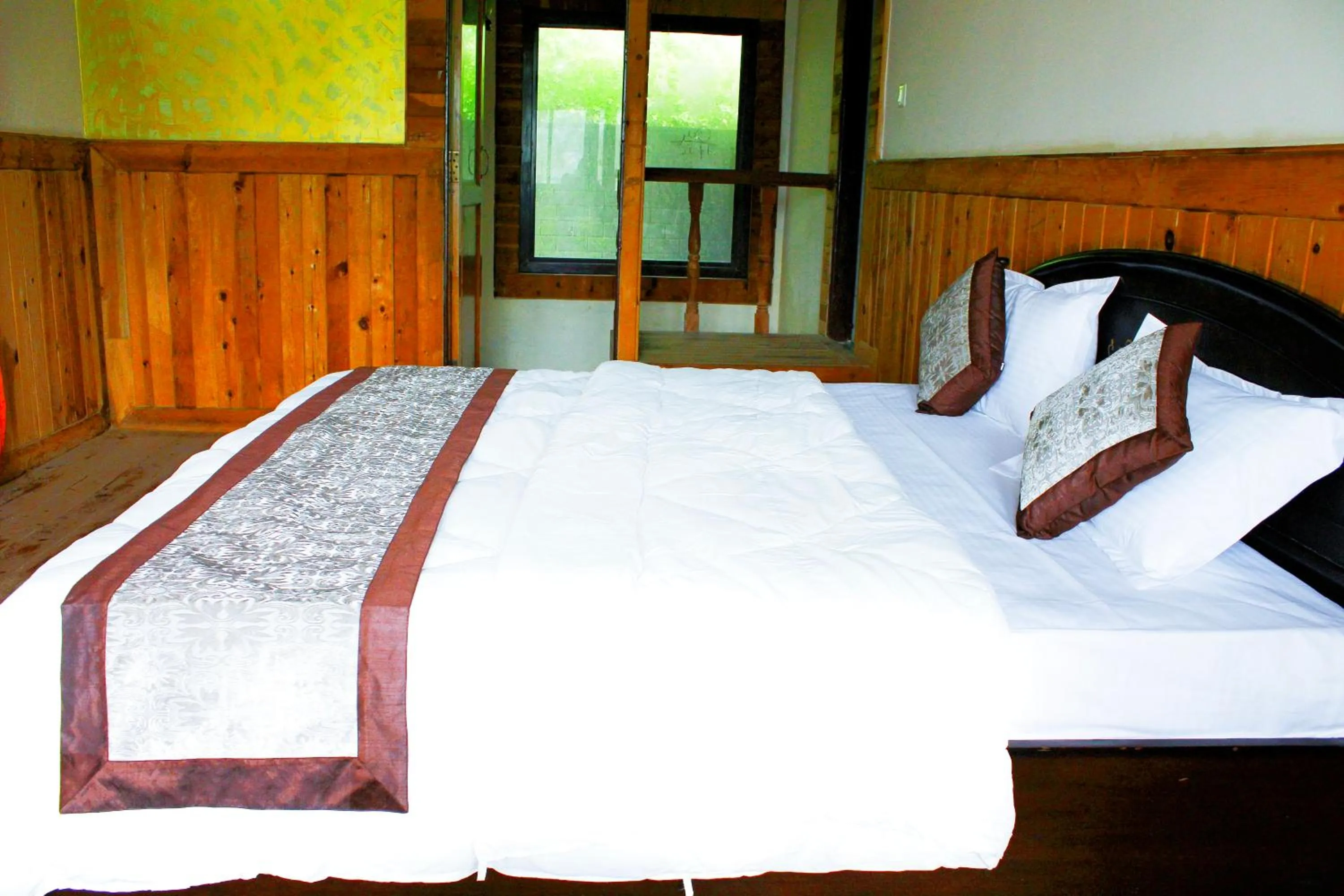 Bed in The Canadian Woods Resort