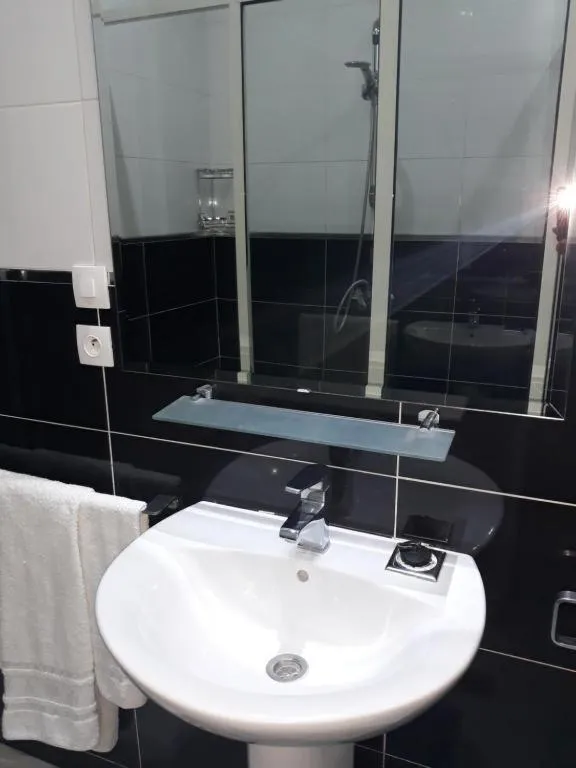 Bathroom in Amor Hotel