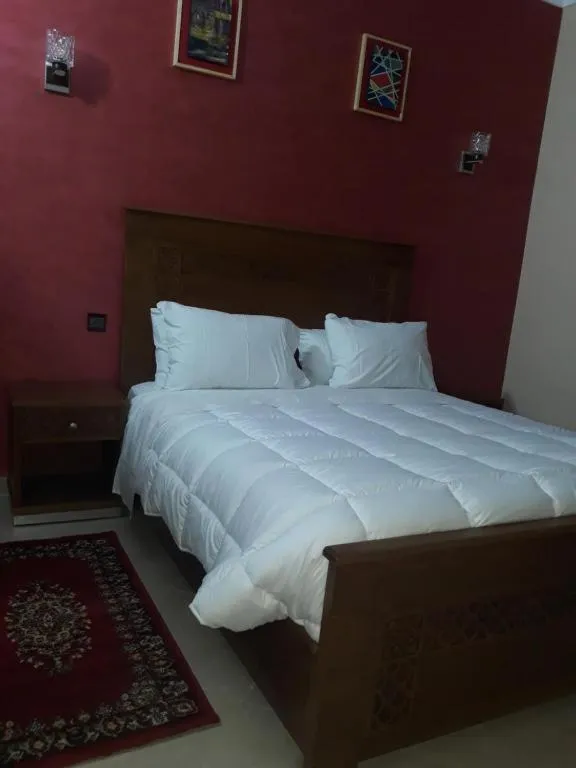 Bed in Amor Hotel