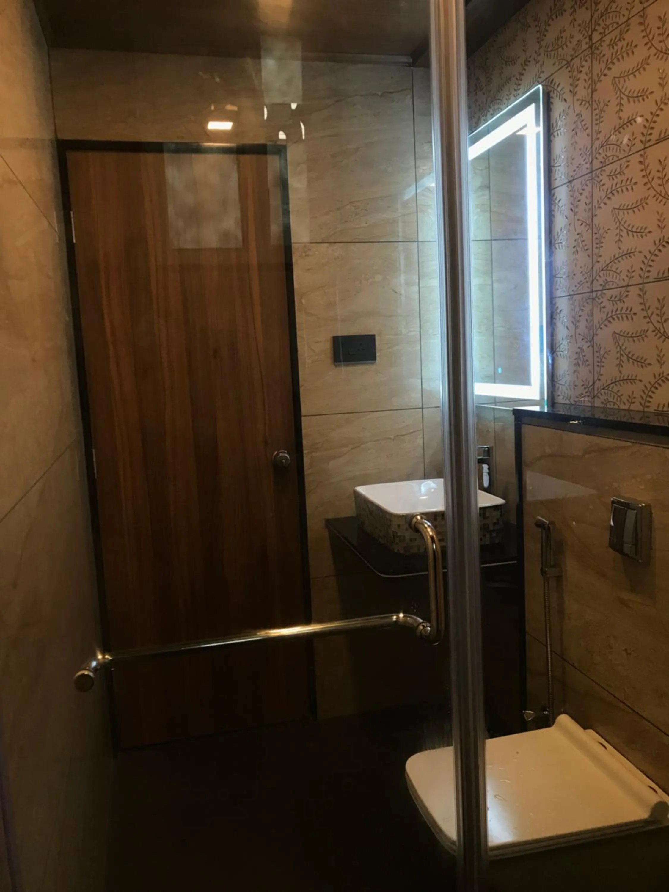 Bathroom in Meenakshi Inn