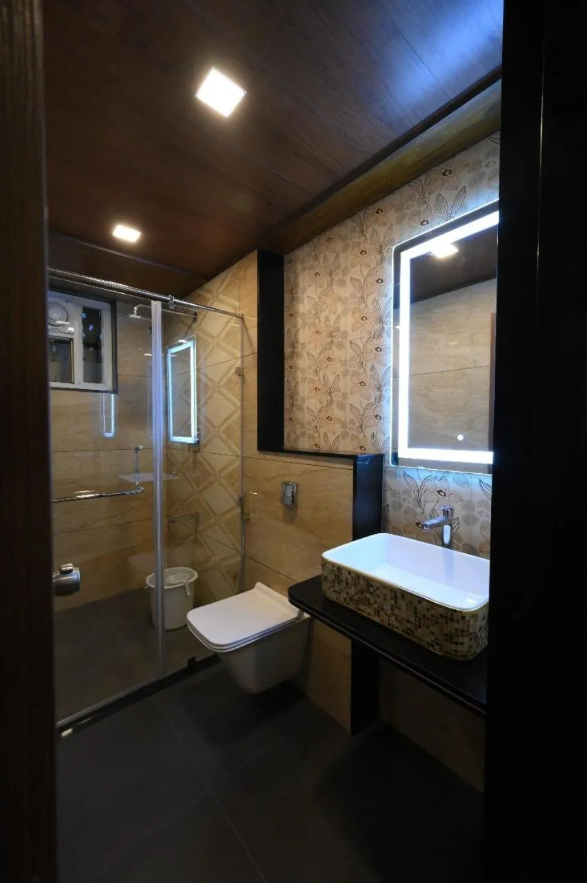 Bathroom in Meenakshi Inn