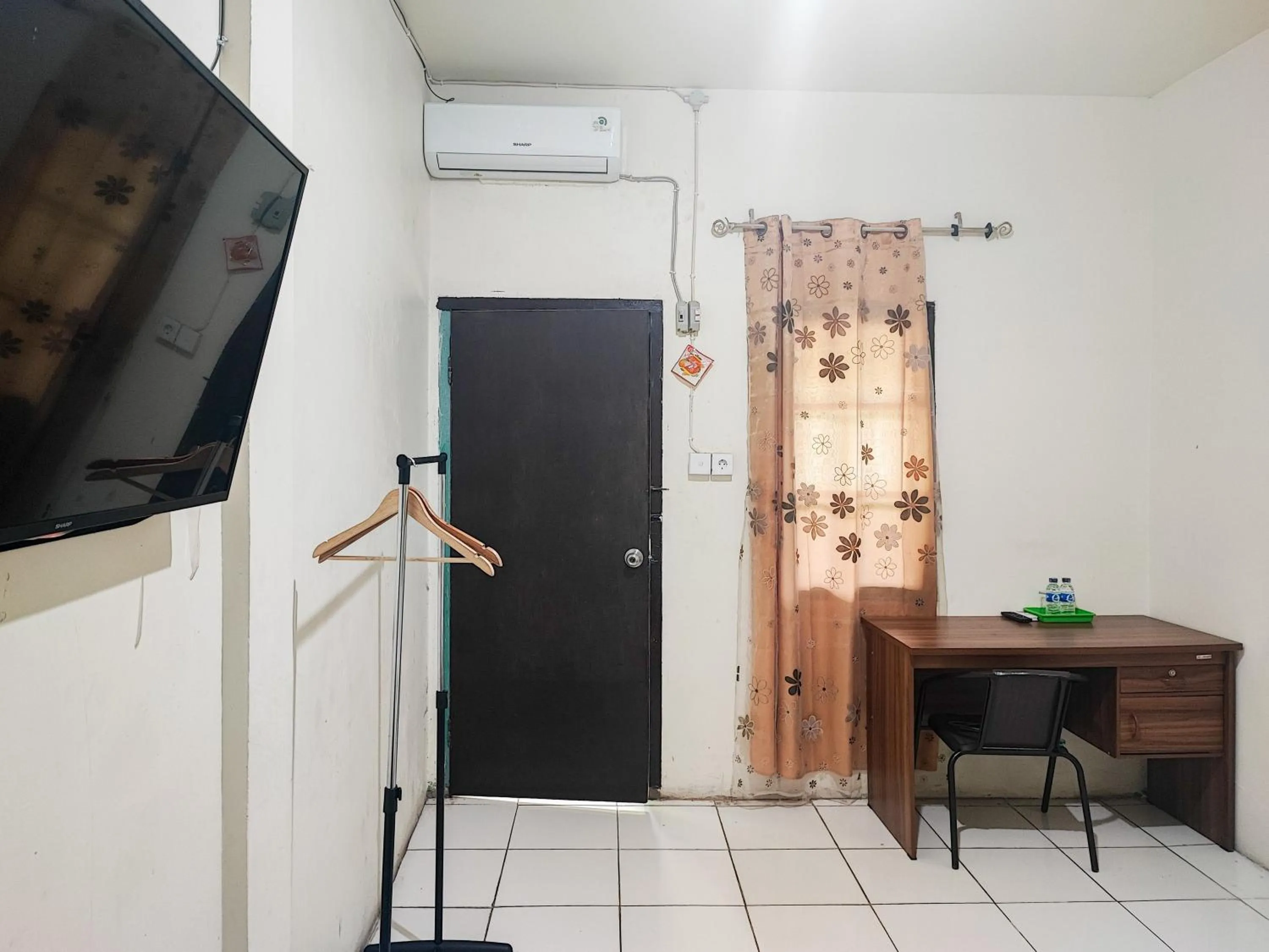 TV and multimedia in RedDoorz Syariah @ Jalan Jendral Sudirman Jambi