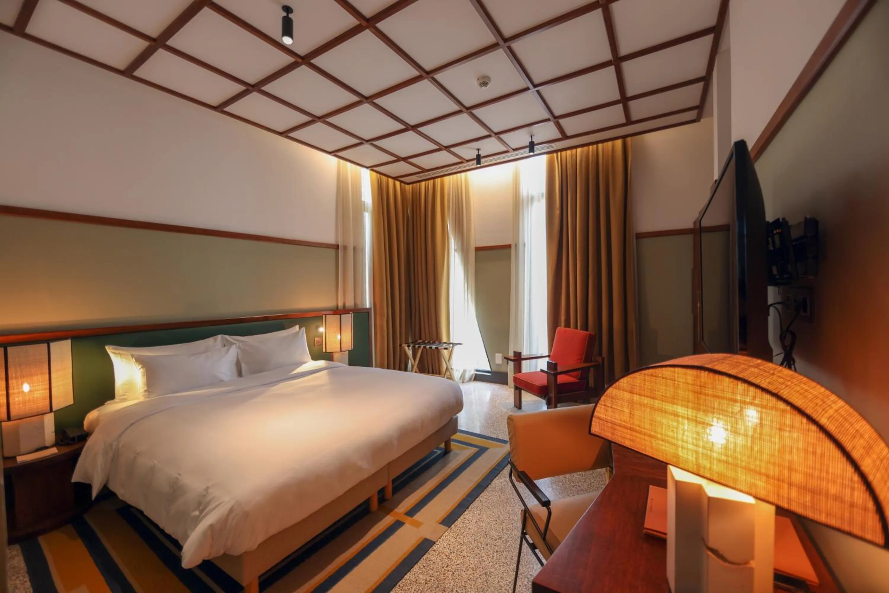 Bed in La Maison Palmier Abidjan, a Member of Design Hotels