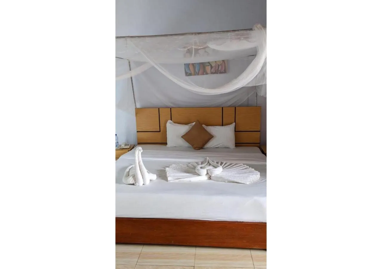 Bed in Chimpanzee Lodge