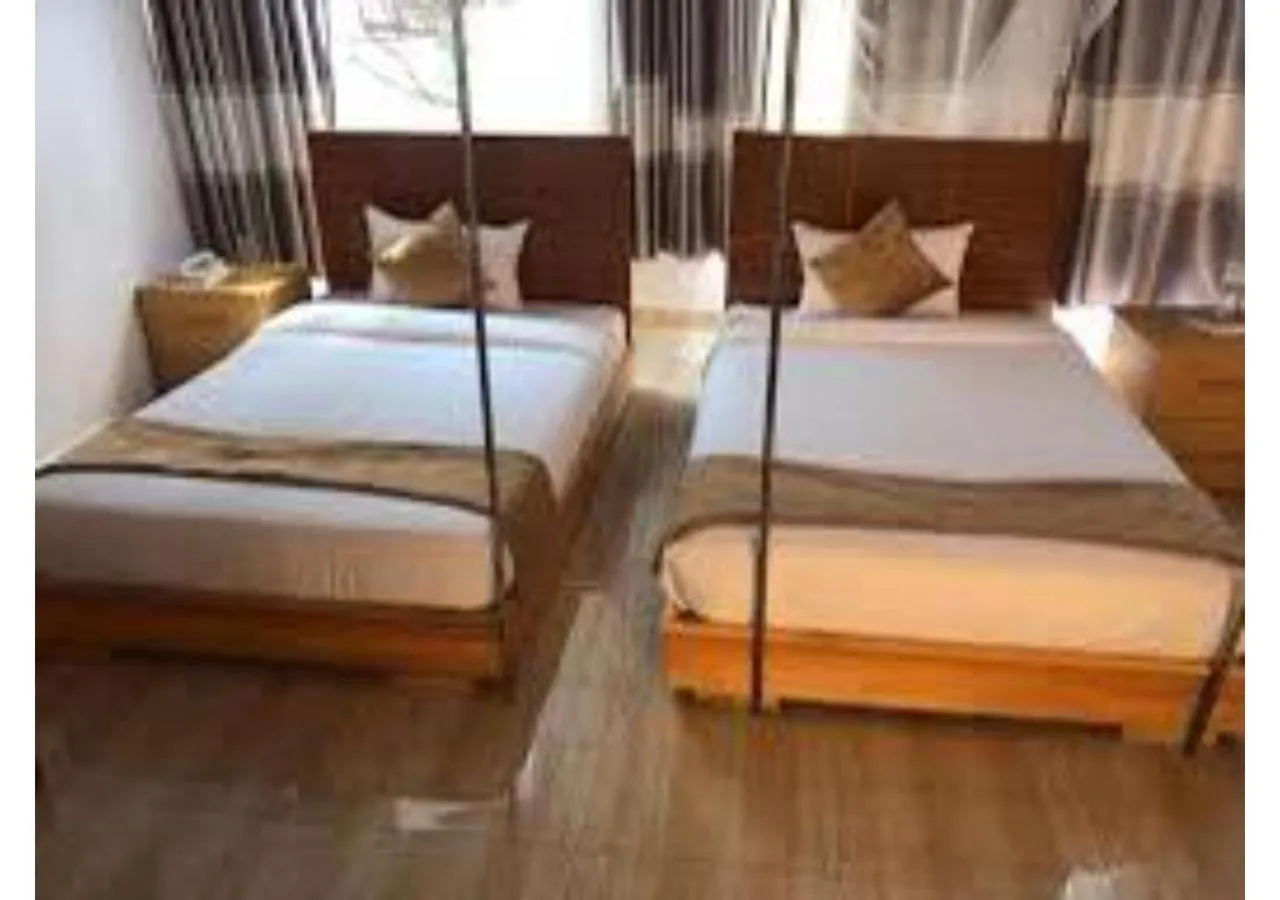 Bed in Chimpanzee Lodge