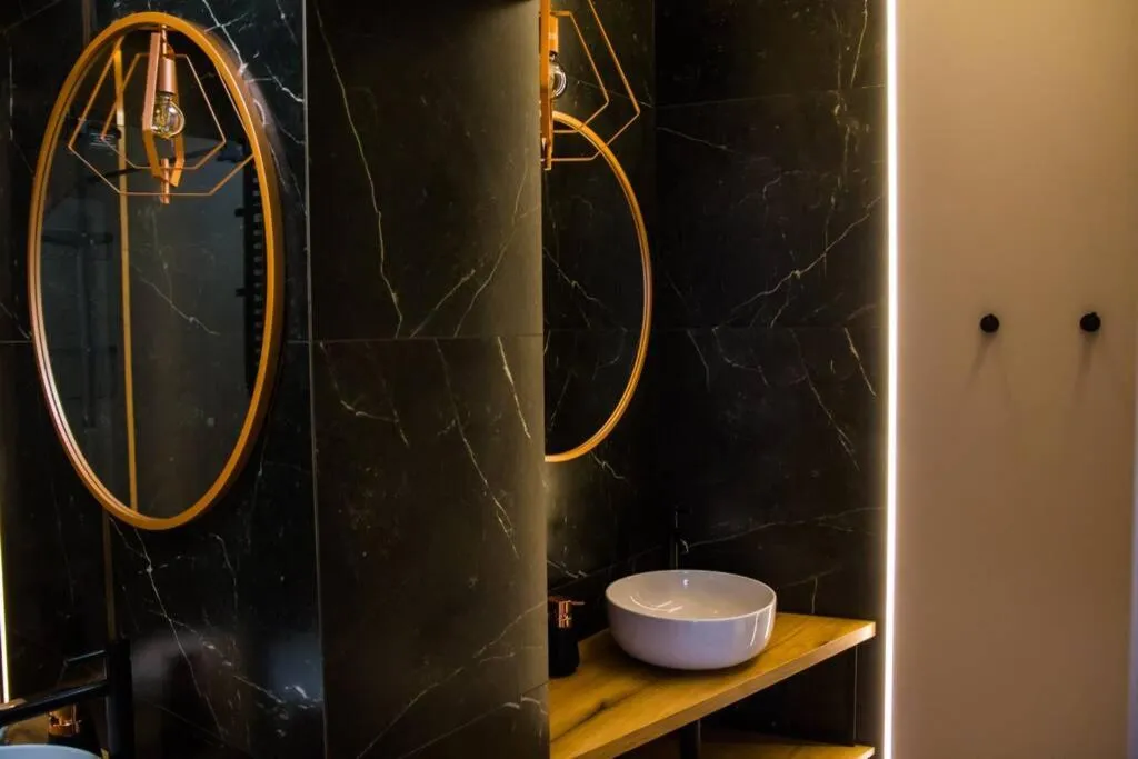 Bathroom in Miedziany by Rentoom