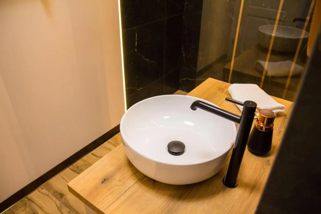 Bathroom in Miedziany by Rentoom